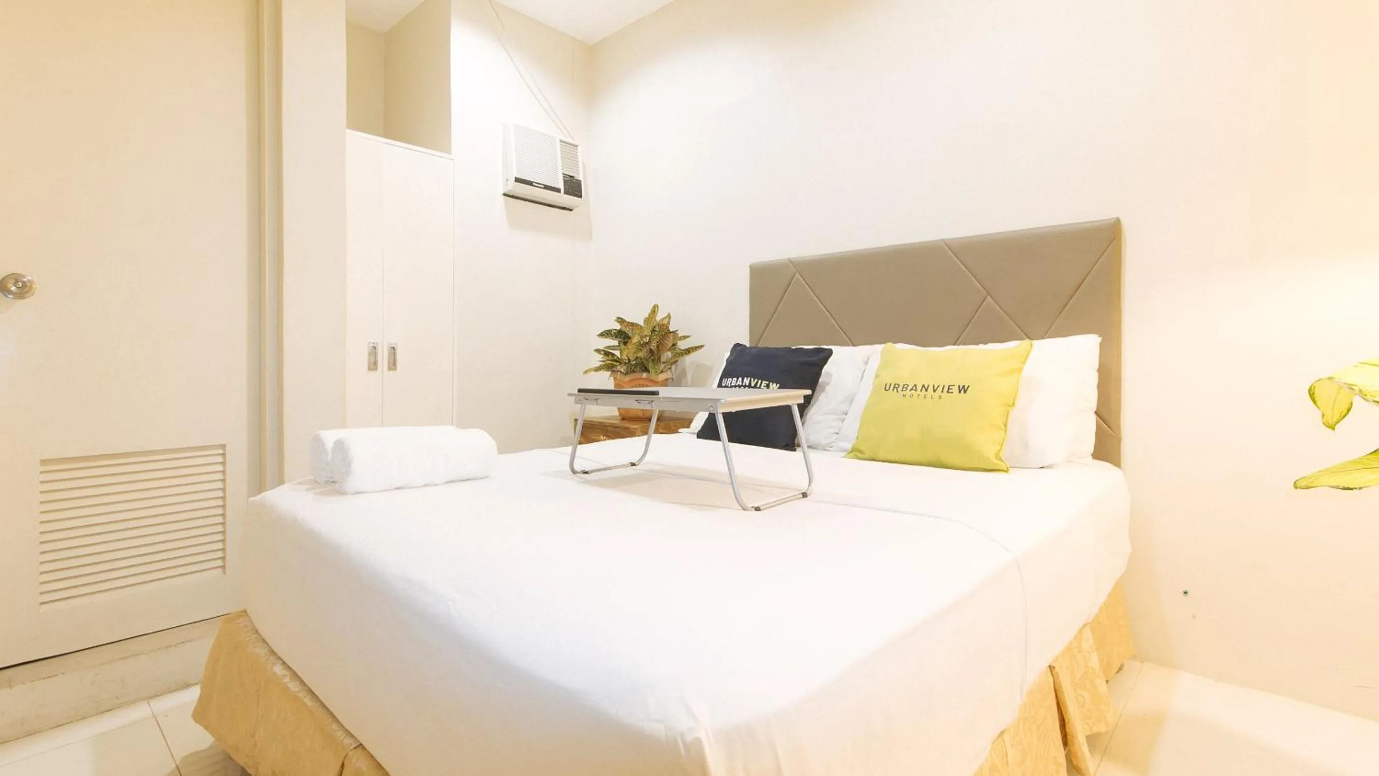 Bedroom, Bed in UrbanView at Lacson Street Bacolod City by RedDoorz
