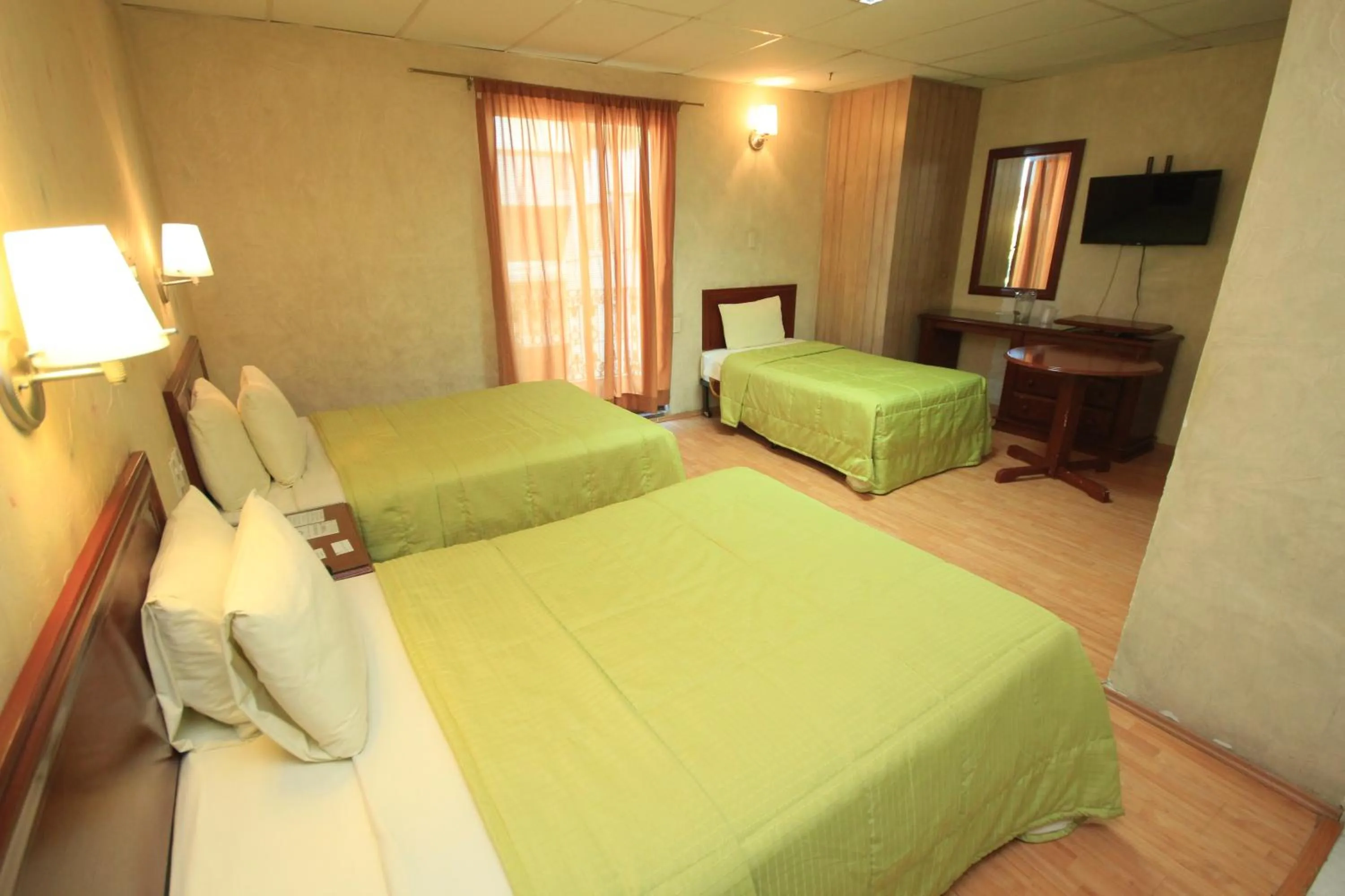 Bed in Hotel Enterprise Inn Plaza