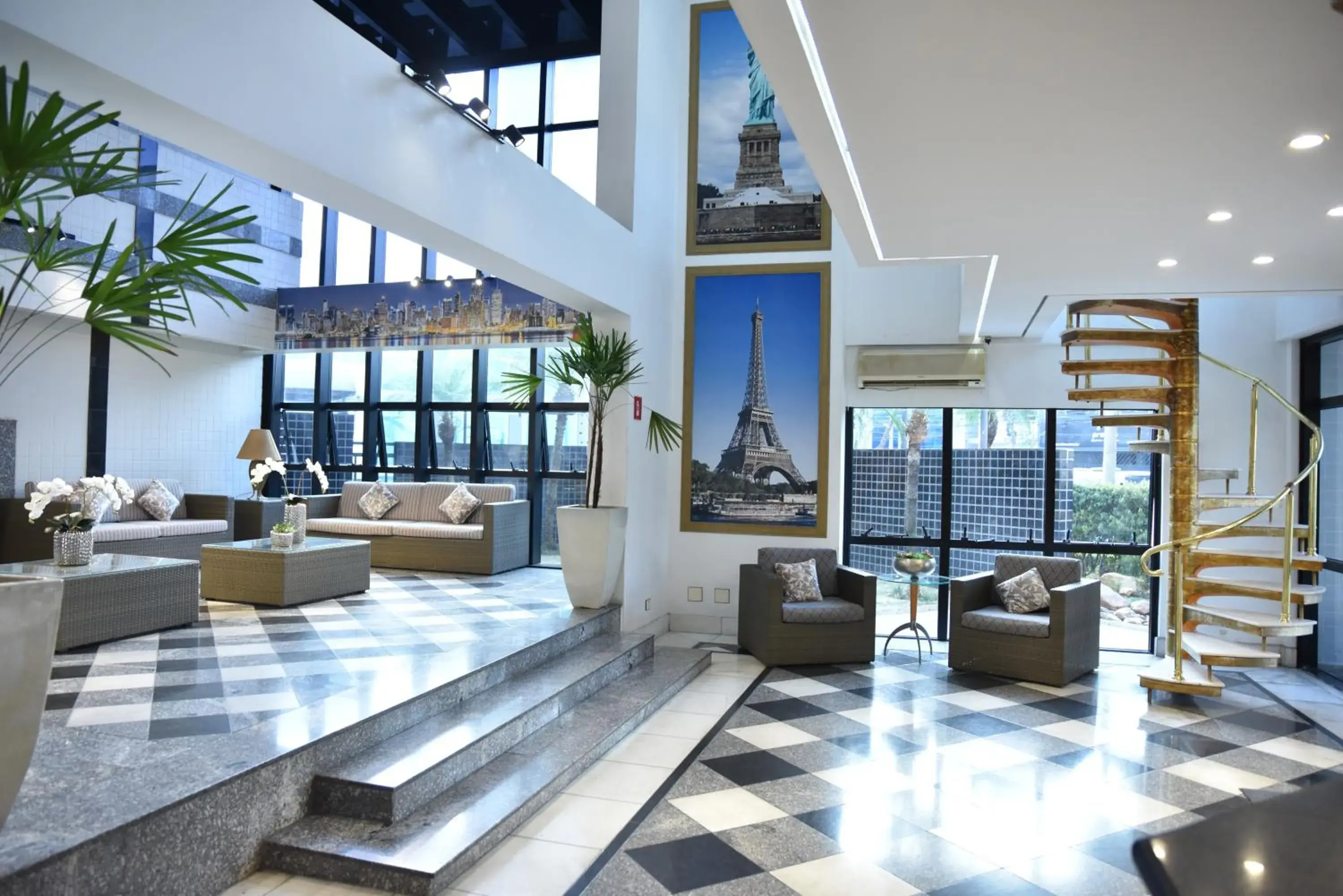 Lobby or reception in Plaza Inn Small Town Flat Lobby or reception in Plaza Inn Small Town Flat