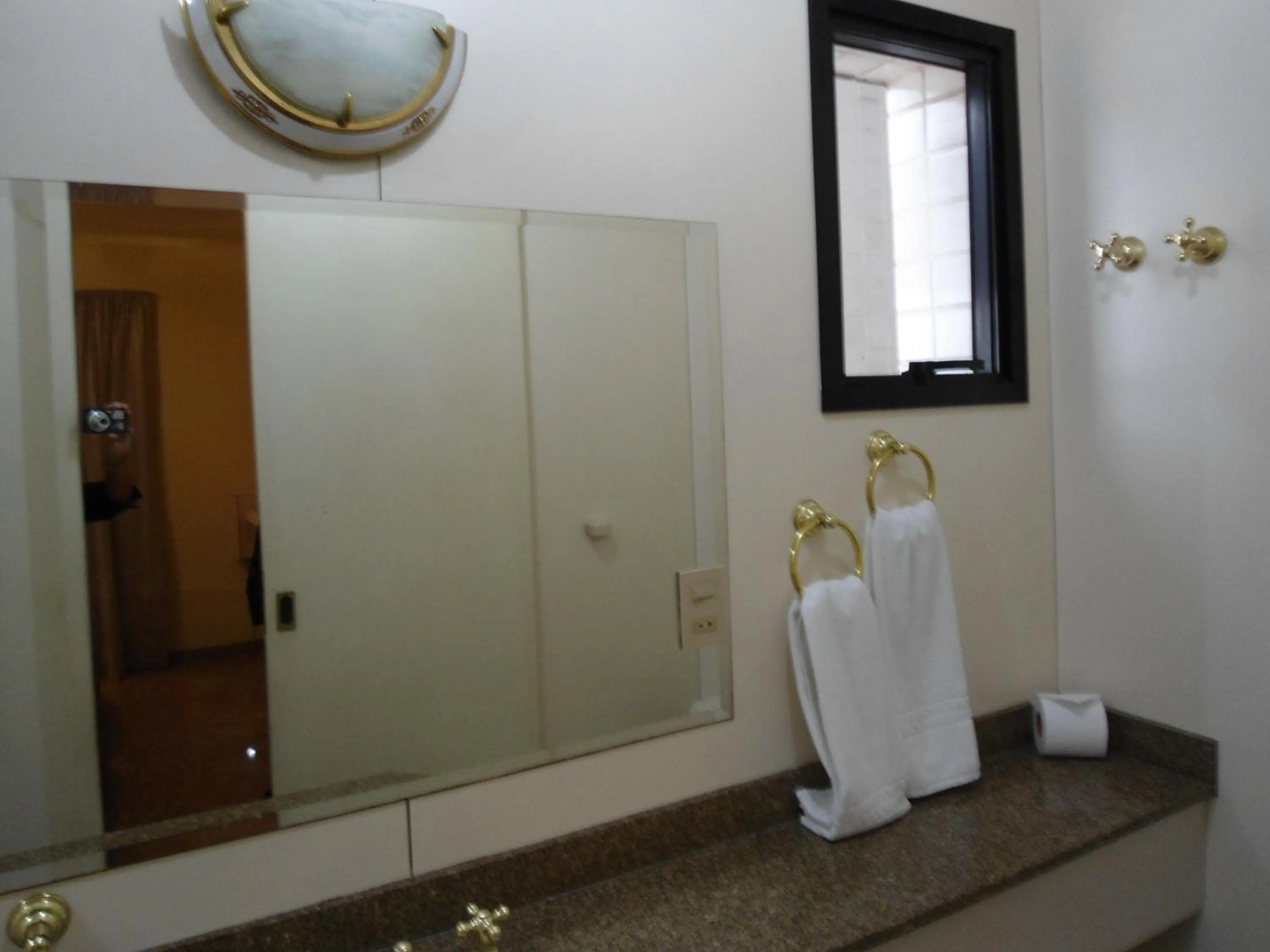 Bathroom in Plaza Inn Small Town Flat