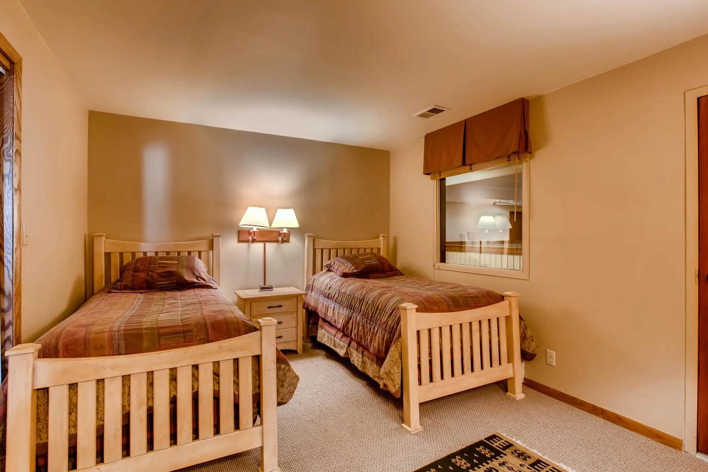 Bed in The Plaza Condominiums, A Vail Resorts Property