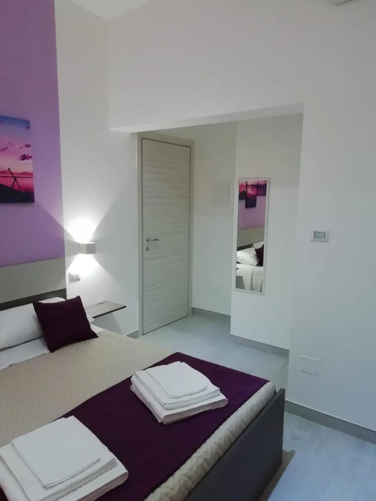 Bed in Flamingo Rooms