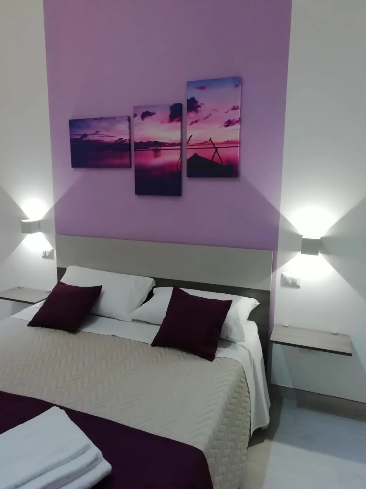 Bed in Flamingo Rooms