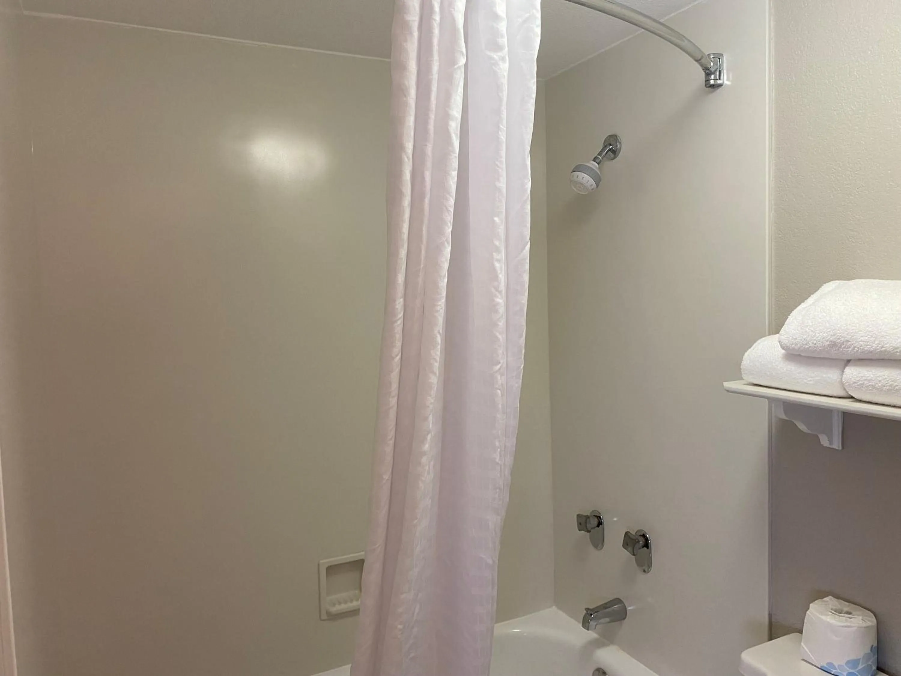 Bathroom in Days Inn & Suites by Wyndham Arlington Heights