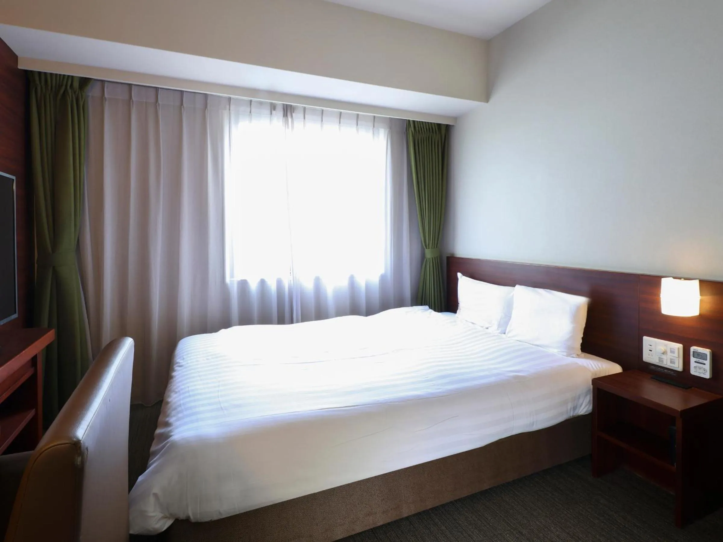 Bed in Dormy Inn Himeji Natural Hot Spring