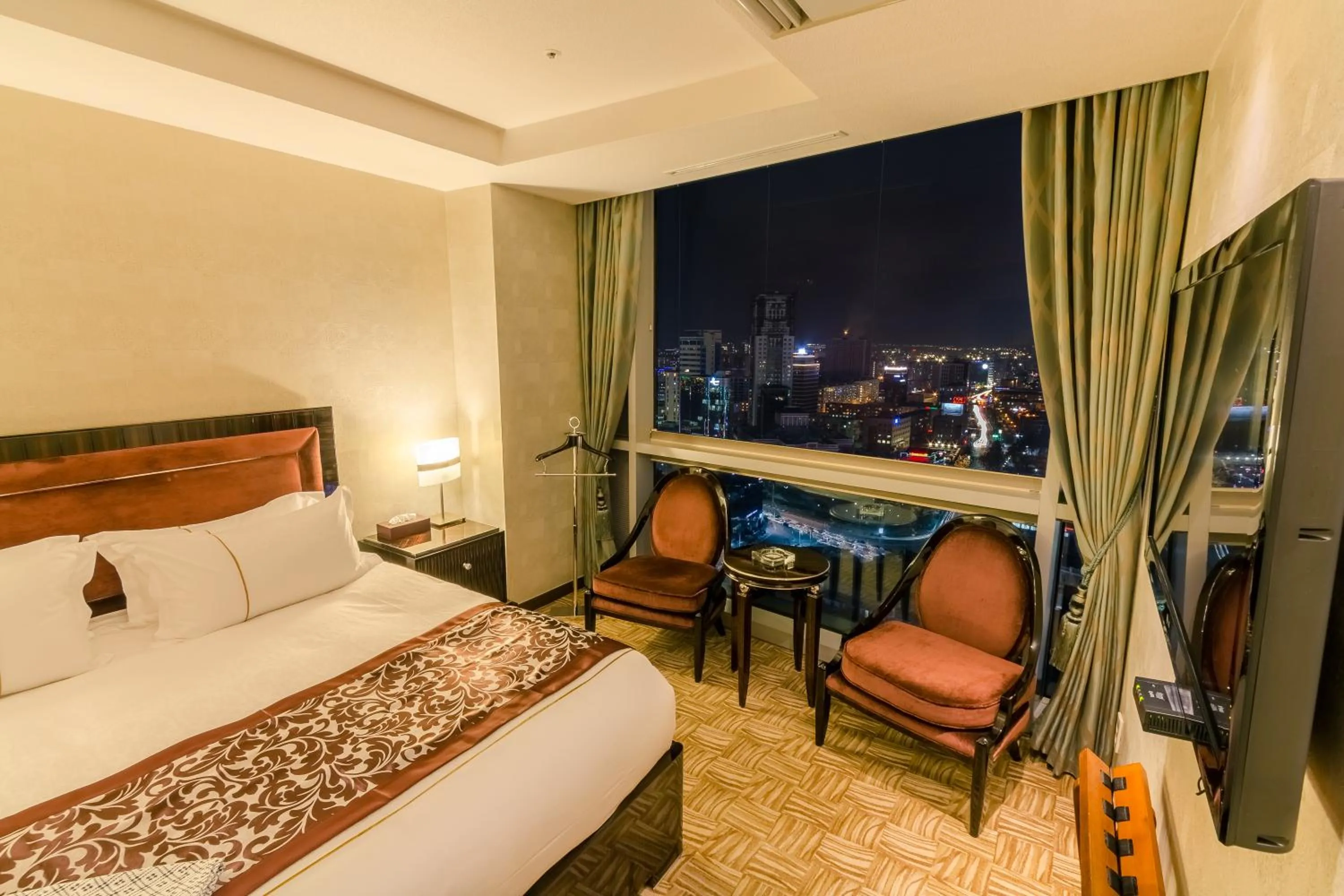 Bed in The Blue Sky Hotel and Tower