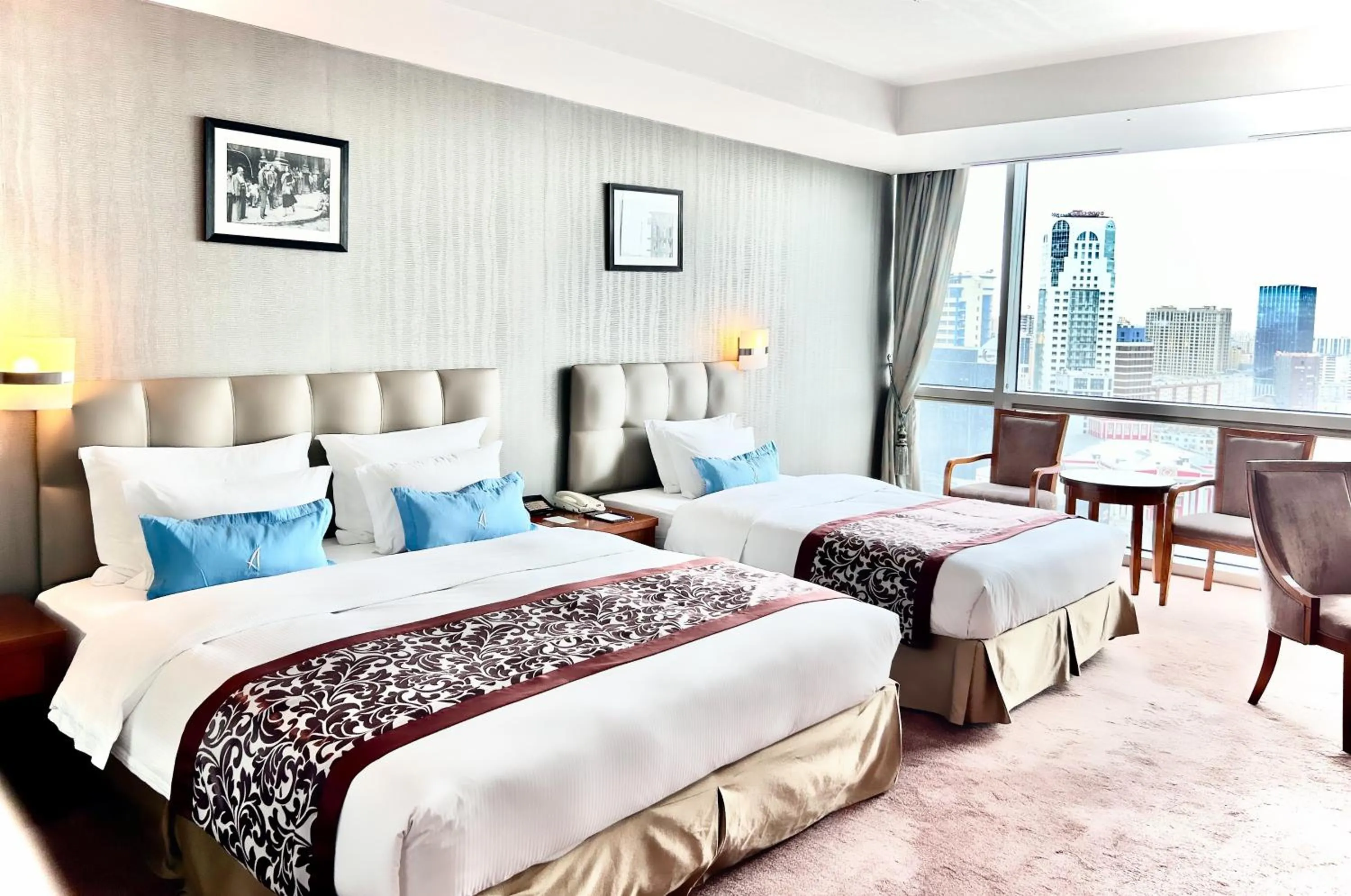 Bed in The Blue Sky Hotel and Tower