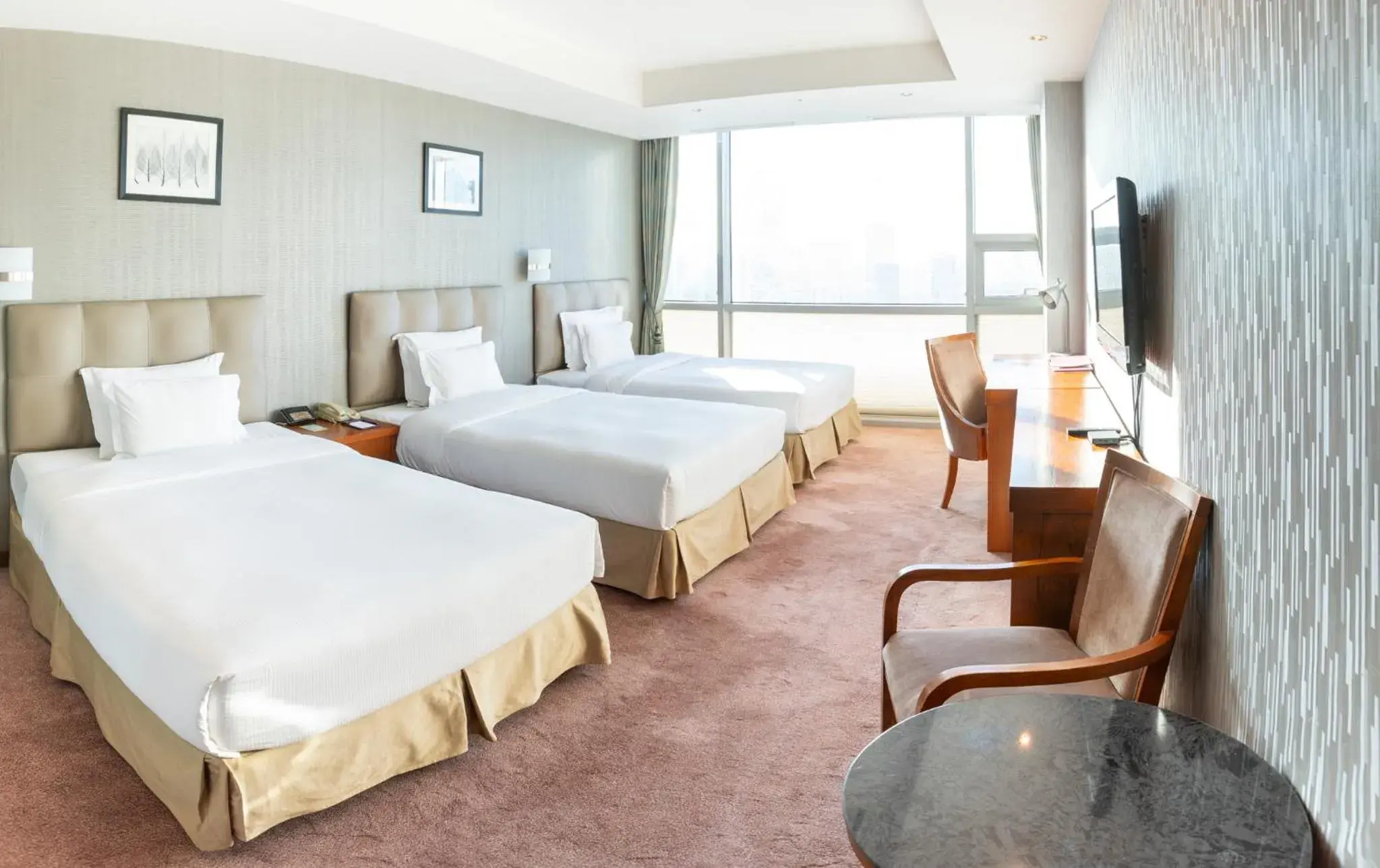 Bed in The Blue Sky Hotel and Tower Bed in The Blue Sky Hotel and Tower