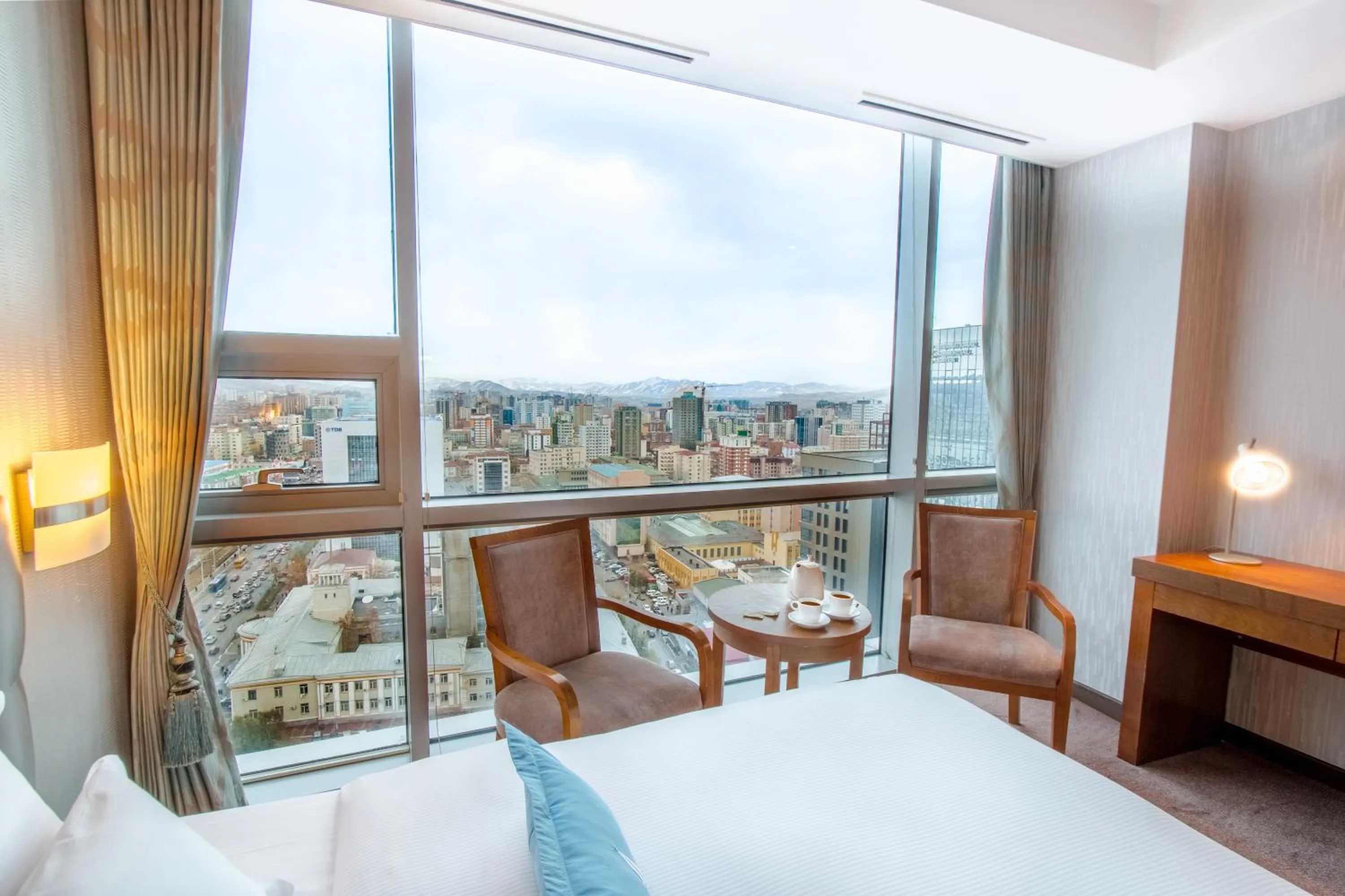 Bed in The Blue Sky Hotel and Tower