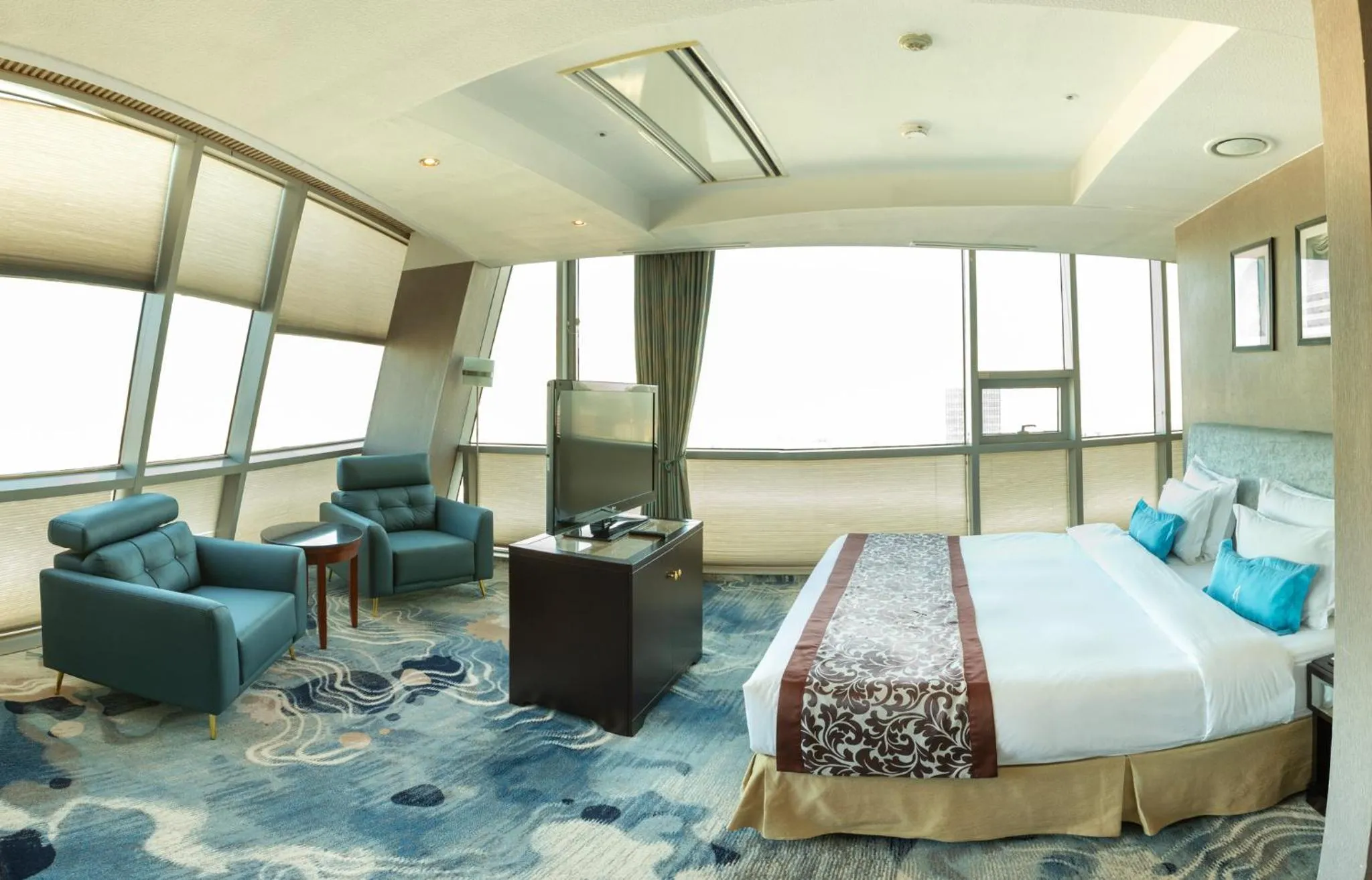 Bed in The Blue Sky Hotel and Tower