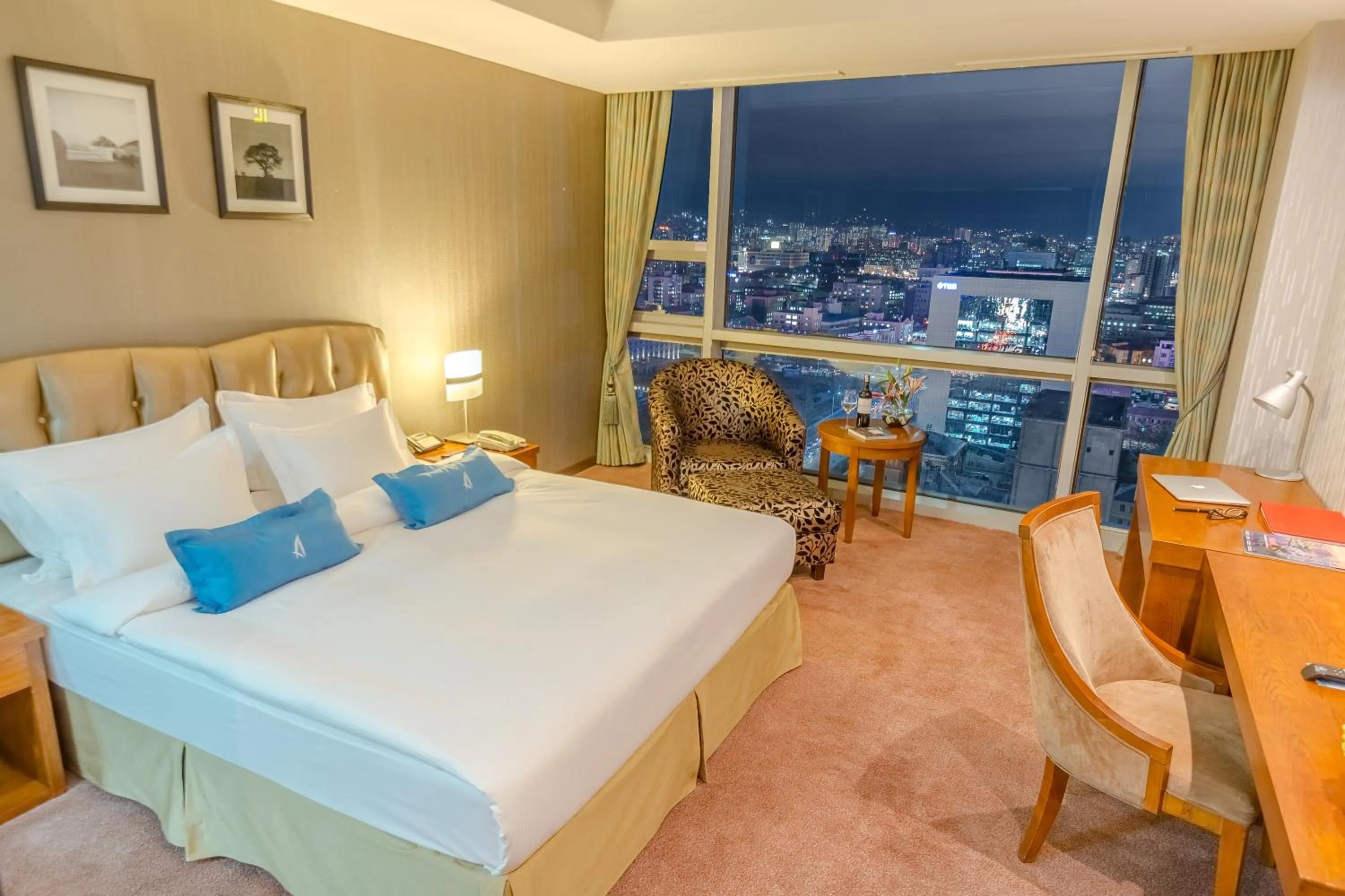 Bed in The Blue Sky Hotel and Tower