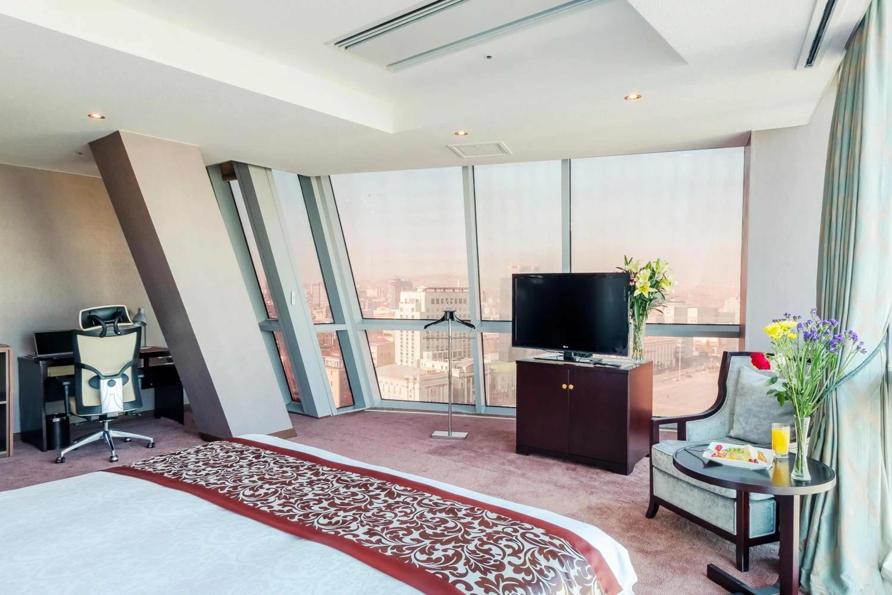 Bed in The Blue Sky Hotel and Tower