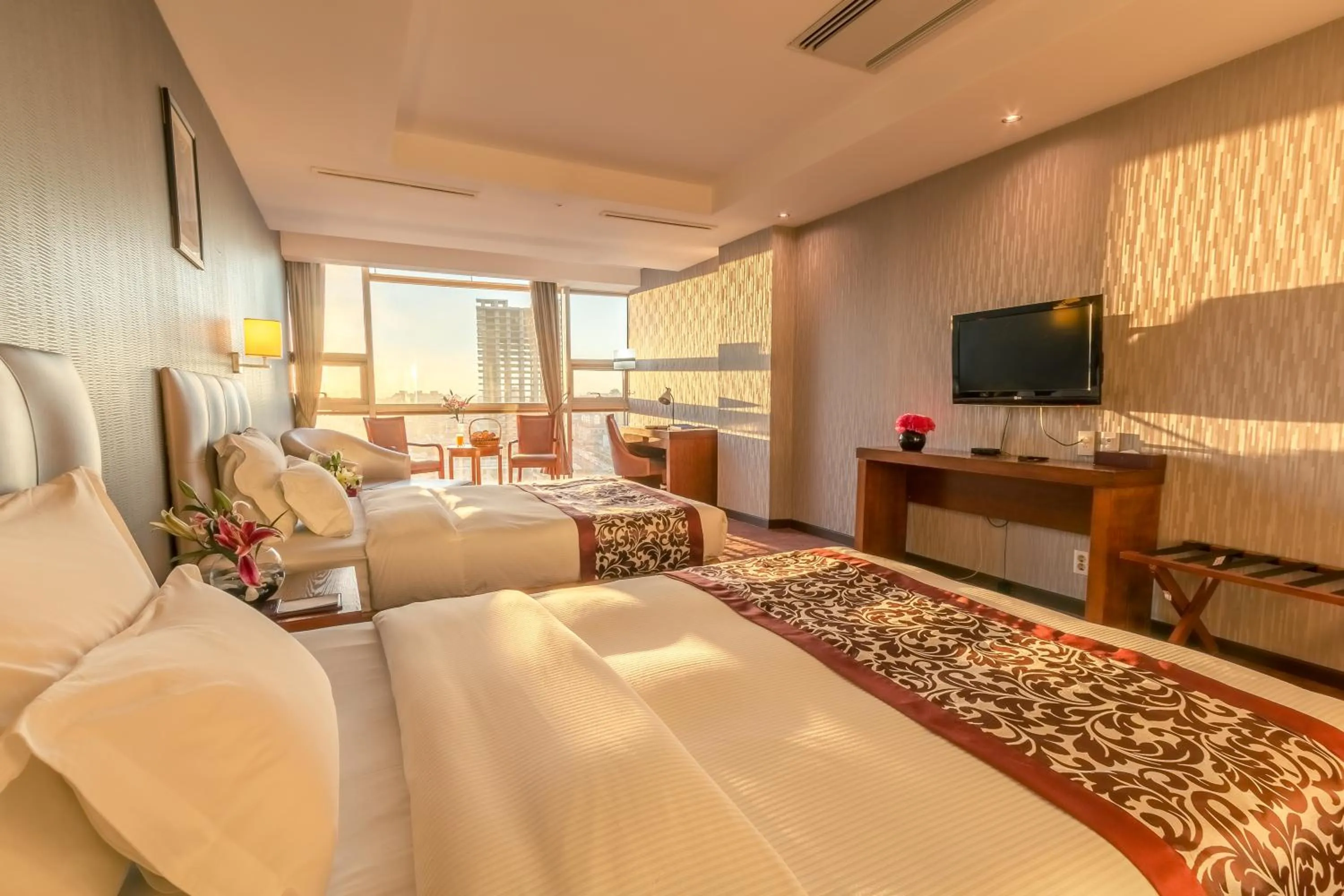 Bed in The Blue Sky Hotel and Tower