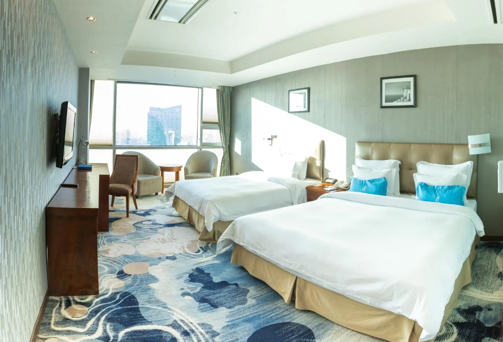 Bed in The Blue Sky Hotel and Tower