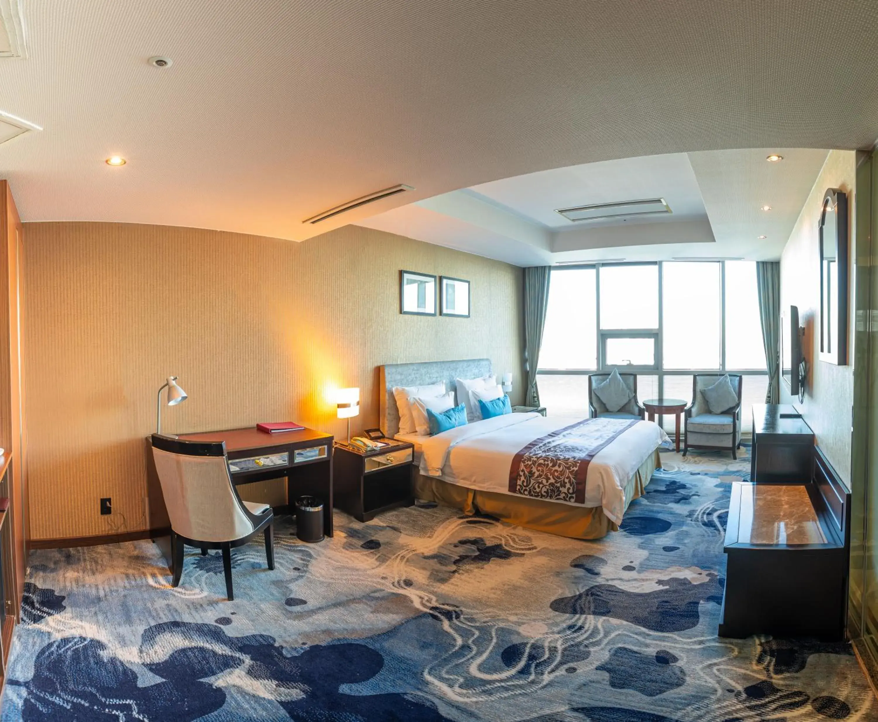 Bed in The Blue Sky Hotel and Tower Bed in The Blue Sky Hotel and Tower