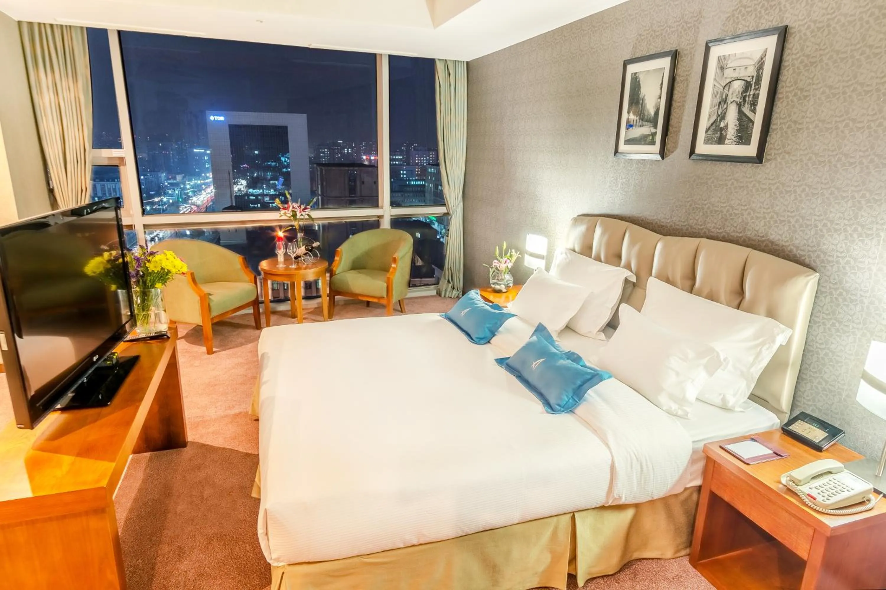 Bed in The Blue Sky Hotel and Tower