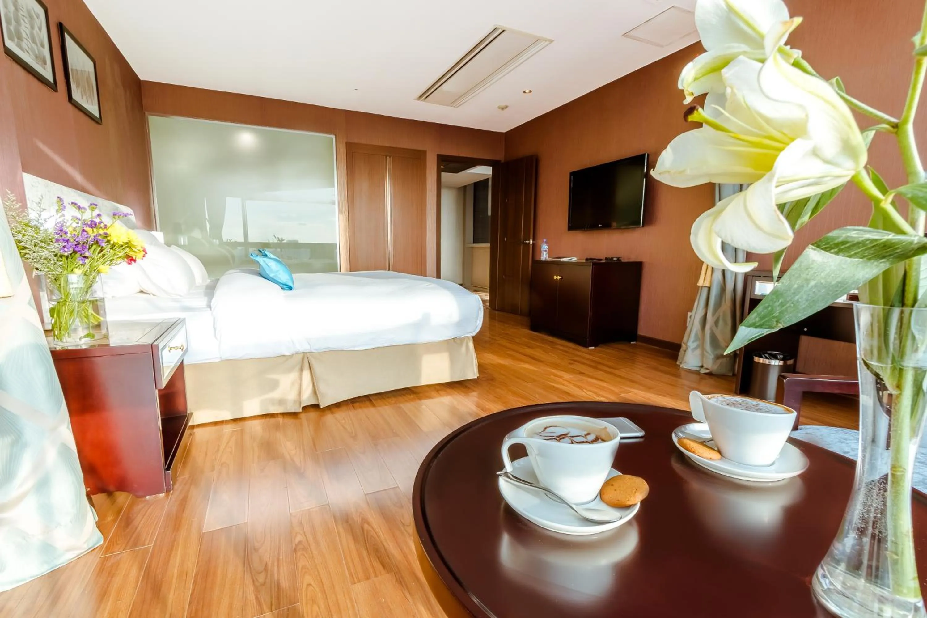 Bed in The Blue Sky Hotel and Tower