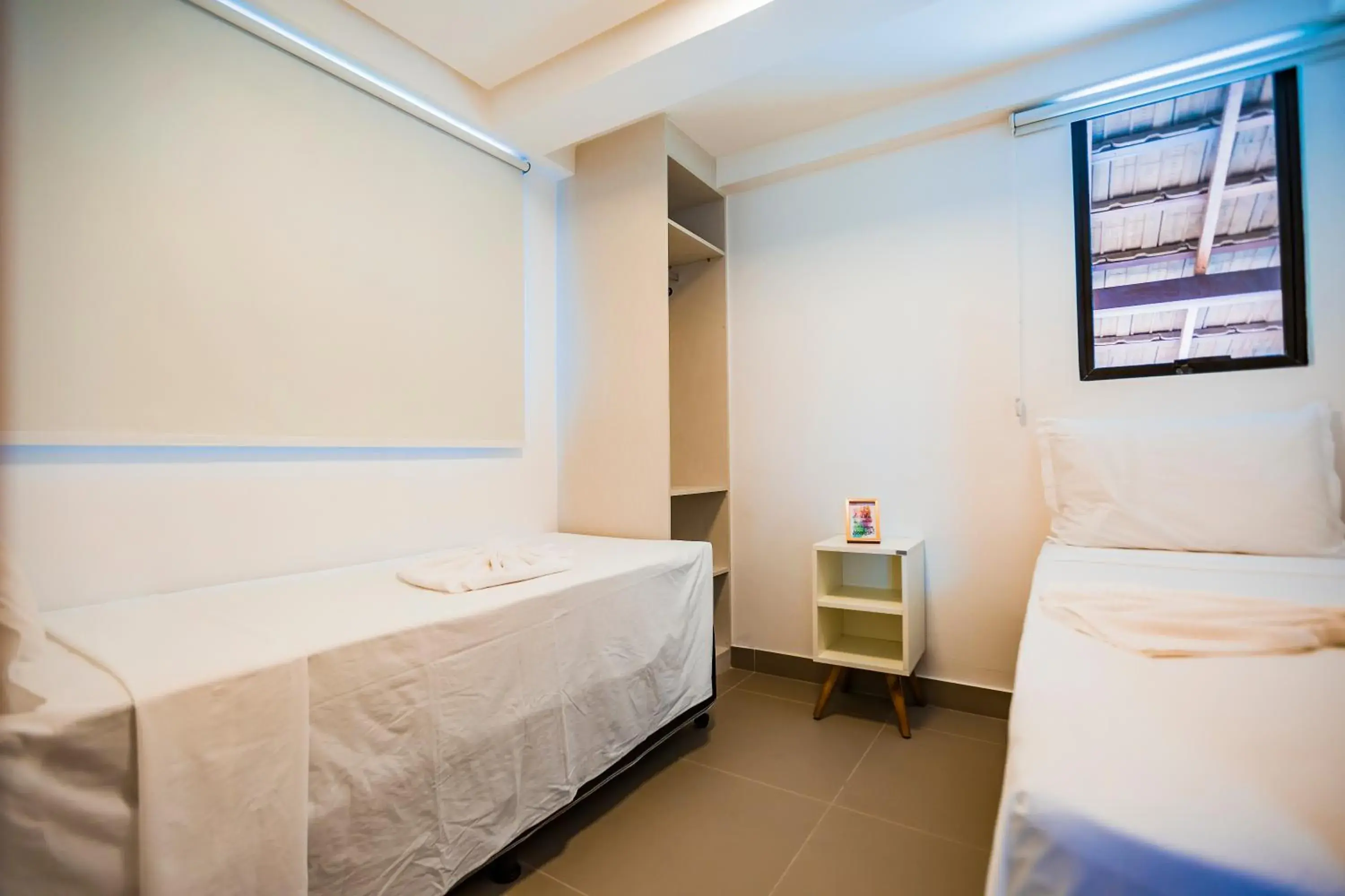 Bed in Macuco Residence Bed in Macuco Residence