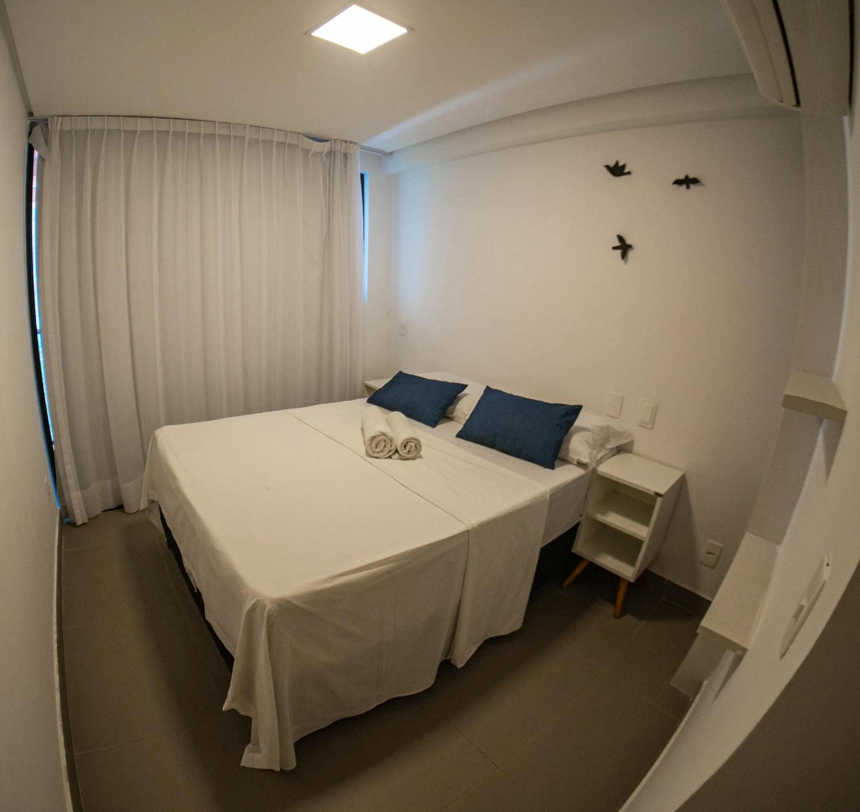 Photo of the whole room, Bed in Macuco Residence