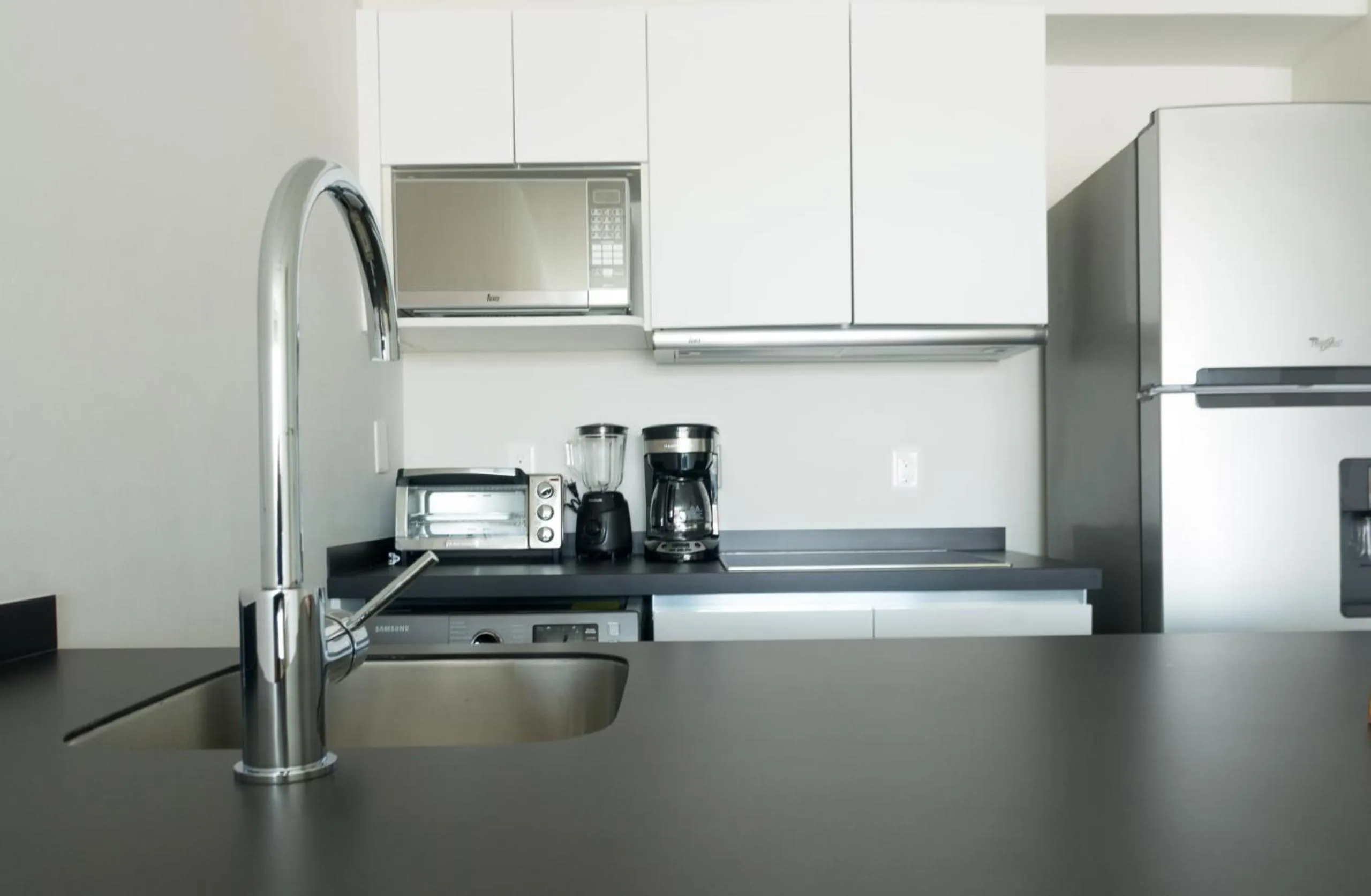 Kitchen or kitchenette in Tropic Playa Apartments