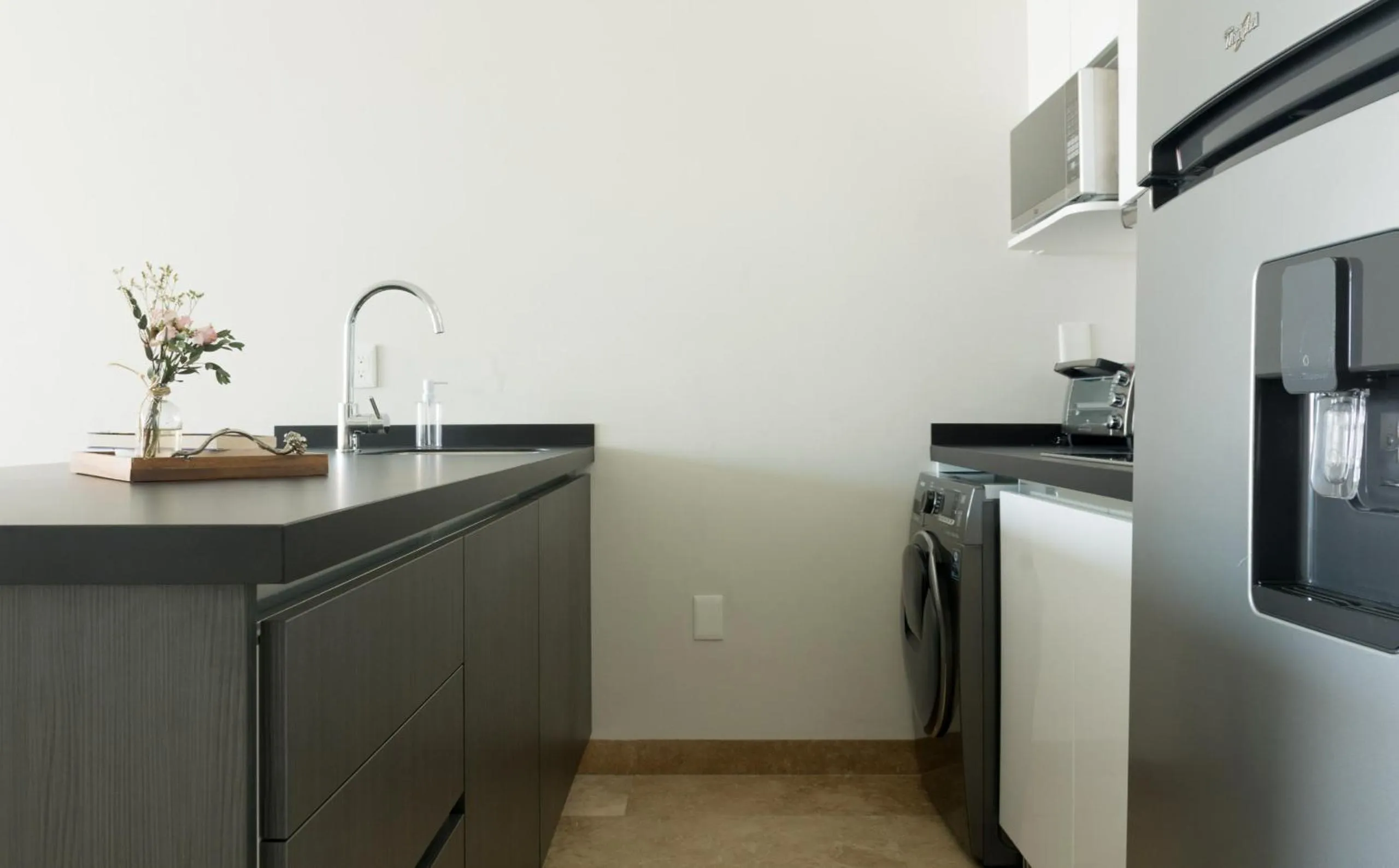 Kitchen or kitchenette in Tropic Playa Apartments