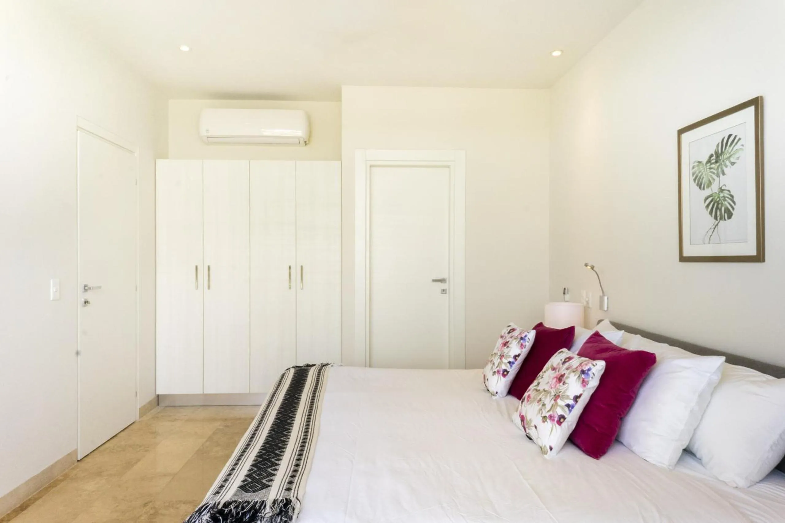 Bed in Tropic Playa Apartments