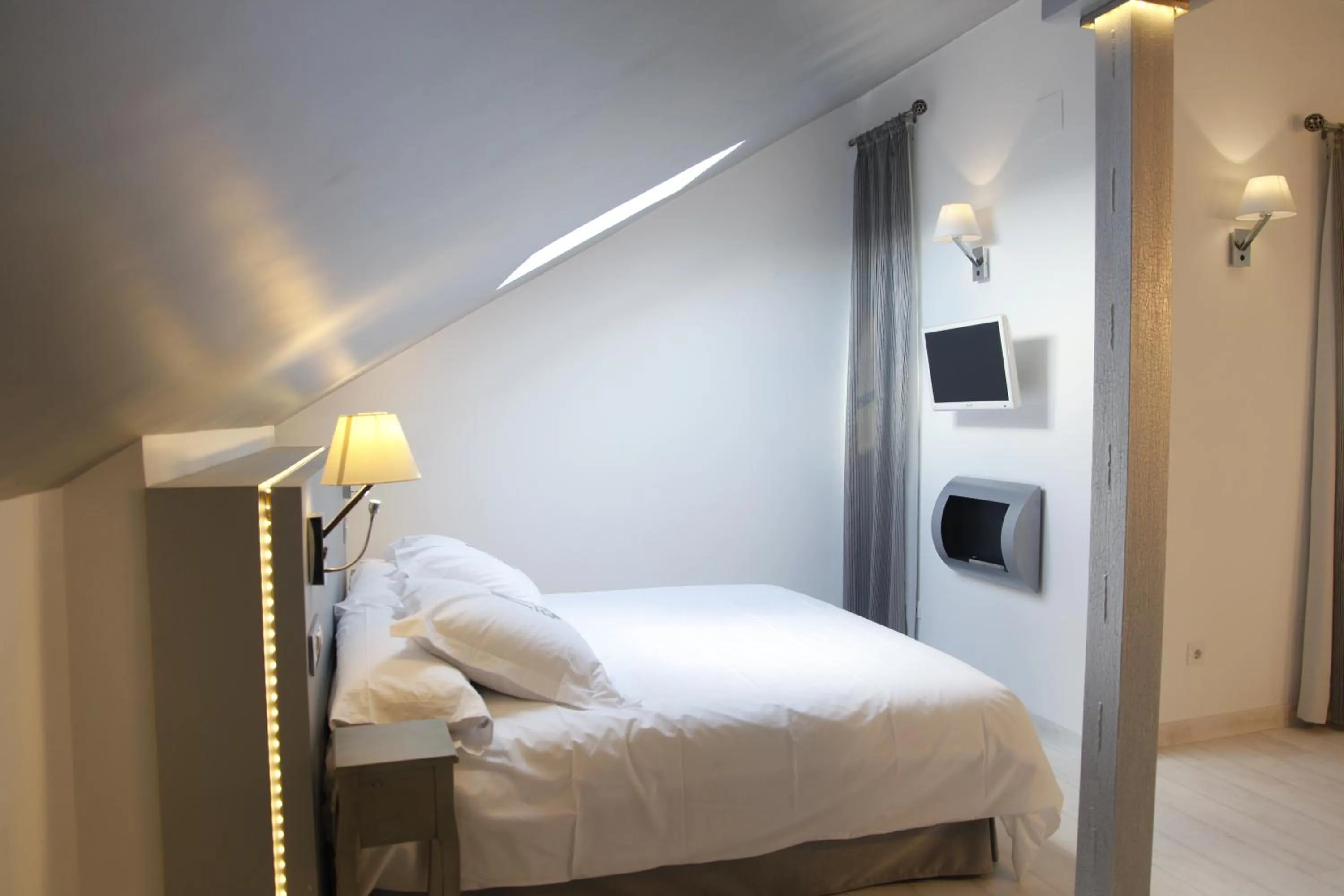 Bed in La Casa del Médico Hotel Boutique