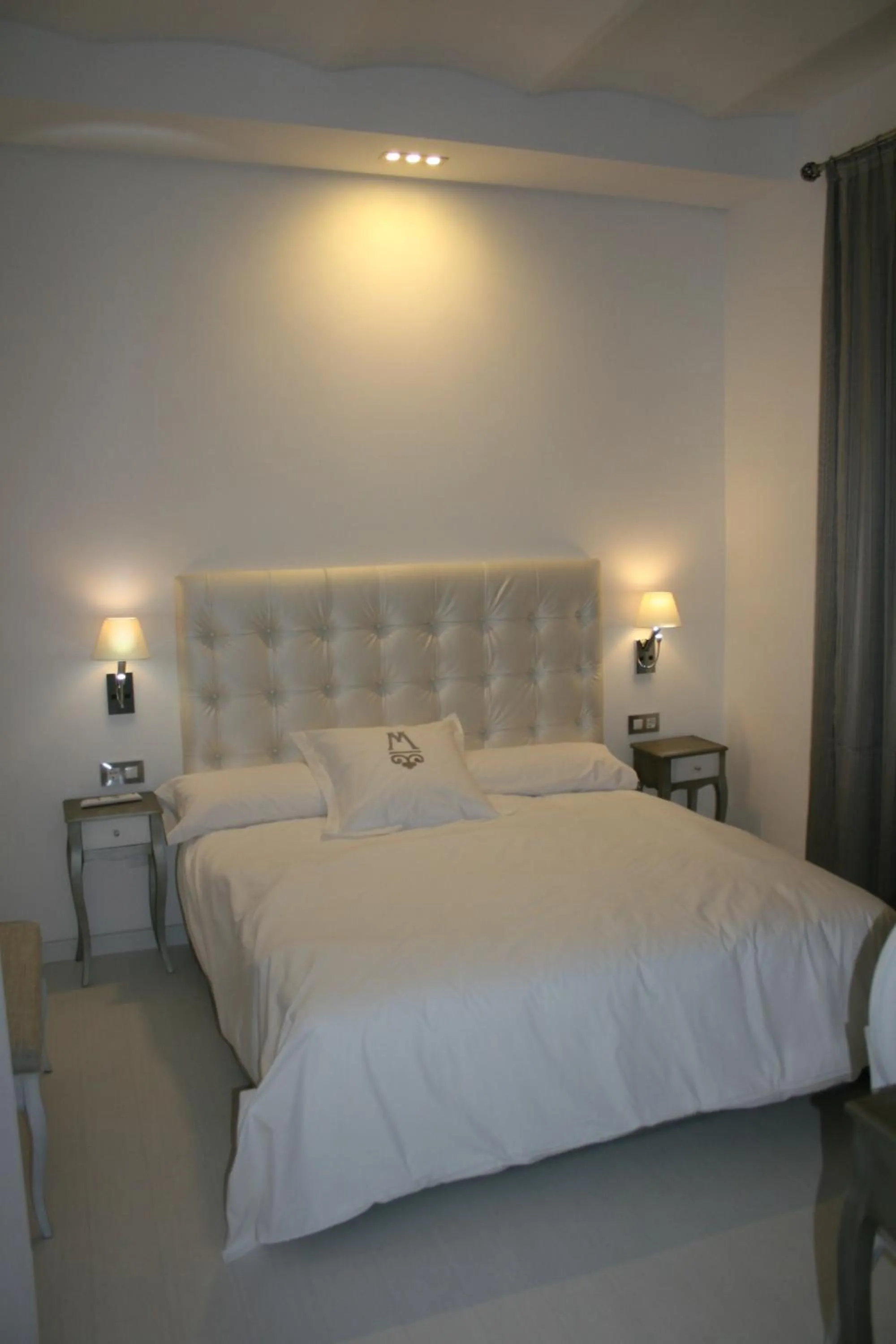 Bed in La Casa del Médico Hotel Boutique