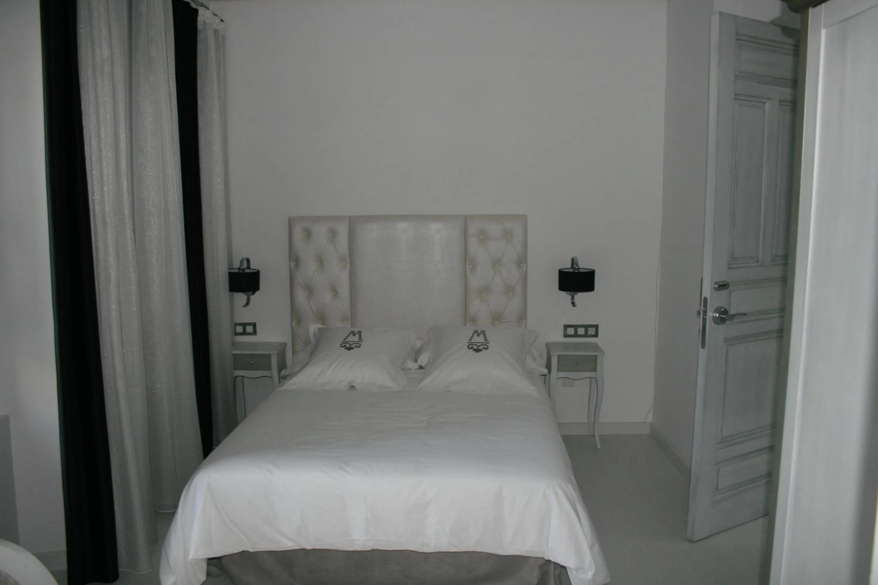 Bed in La Casa del Médico Hotel Boutique