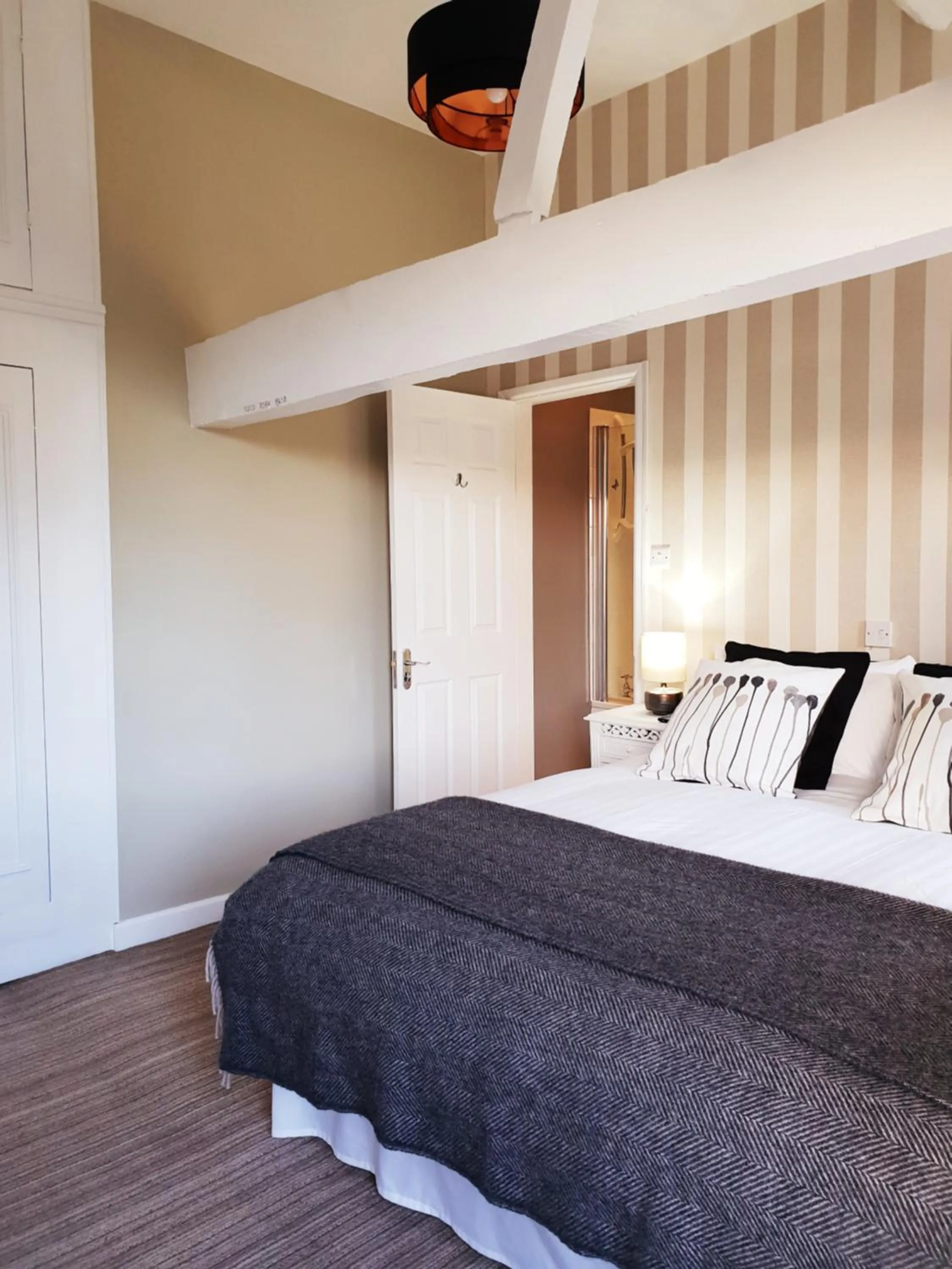 Bed in Orles Barn Guest House