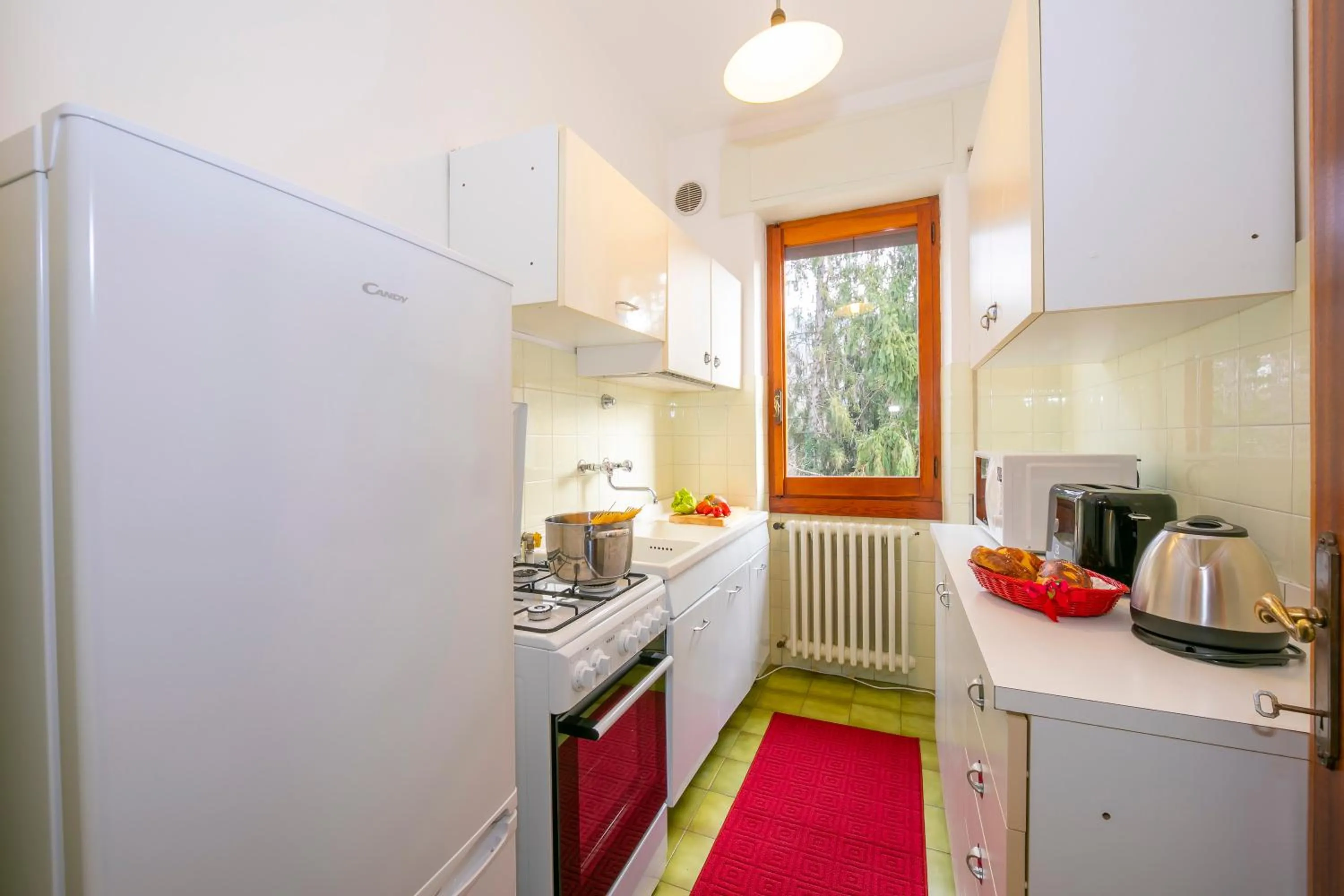 Kitchen or kitchenette in Villa La Verbanina Private Garden - Happy Rentals