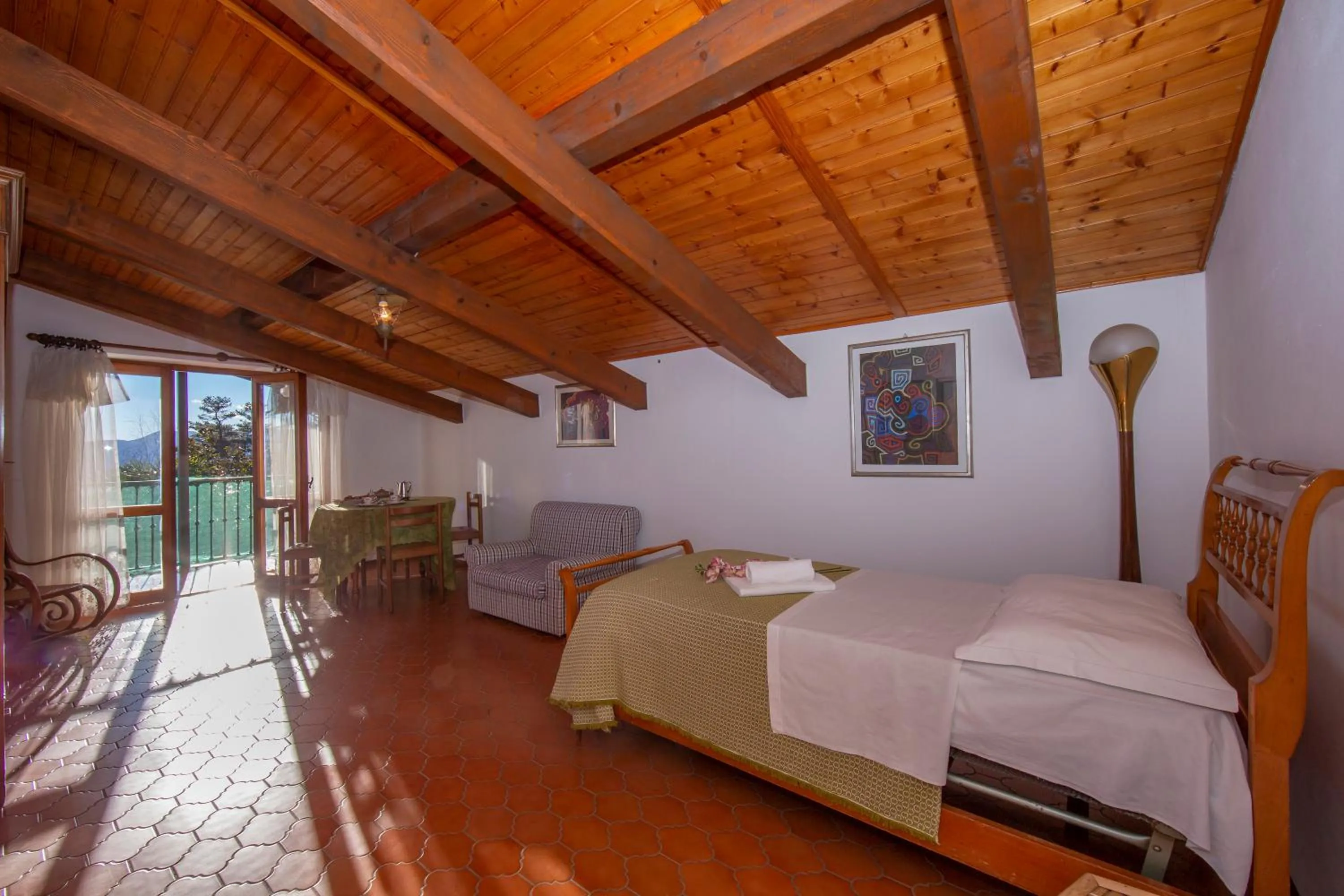 Bedroom, Bed in Villa La Verbanina Private Garden - Happy Rentals