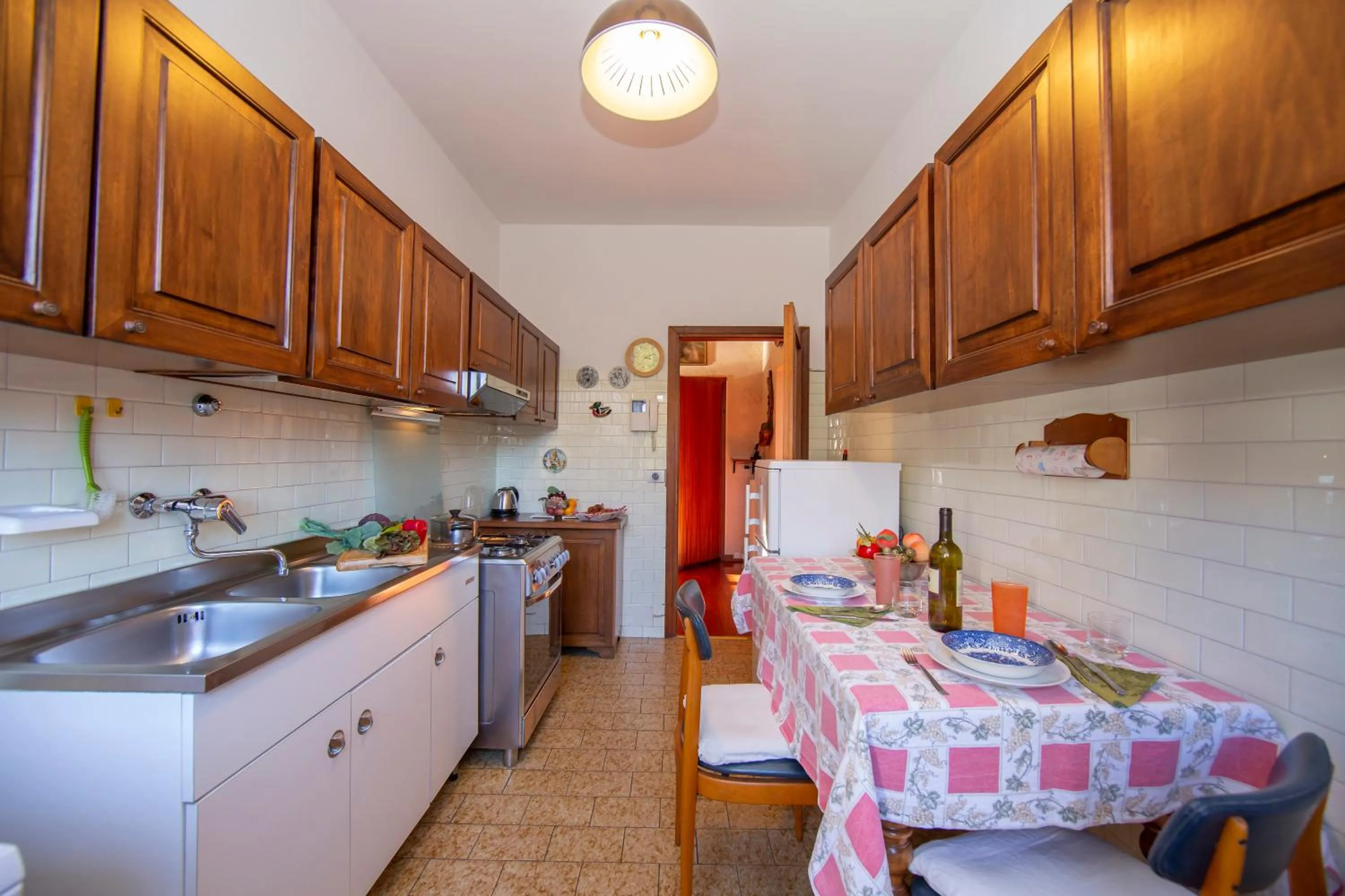 Kitchen or kitchenette in Villa La Verbanina Private Garden - Happy Rentals