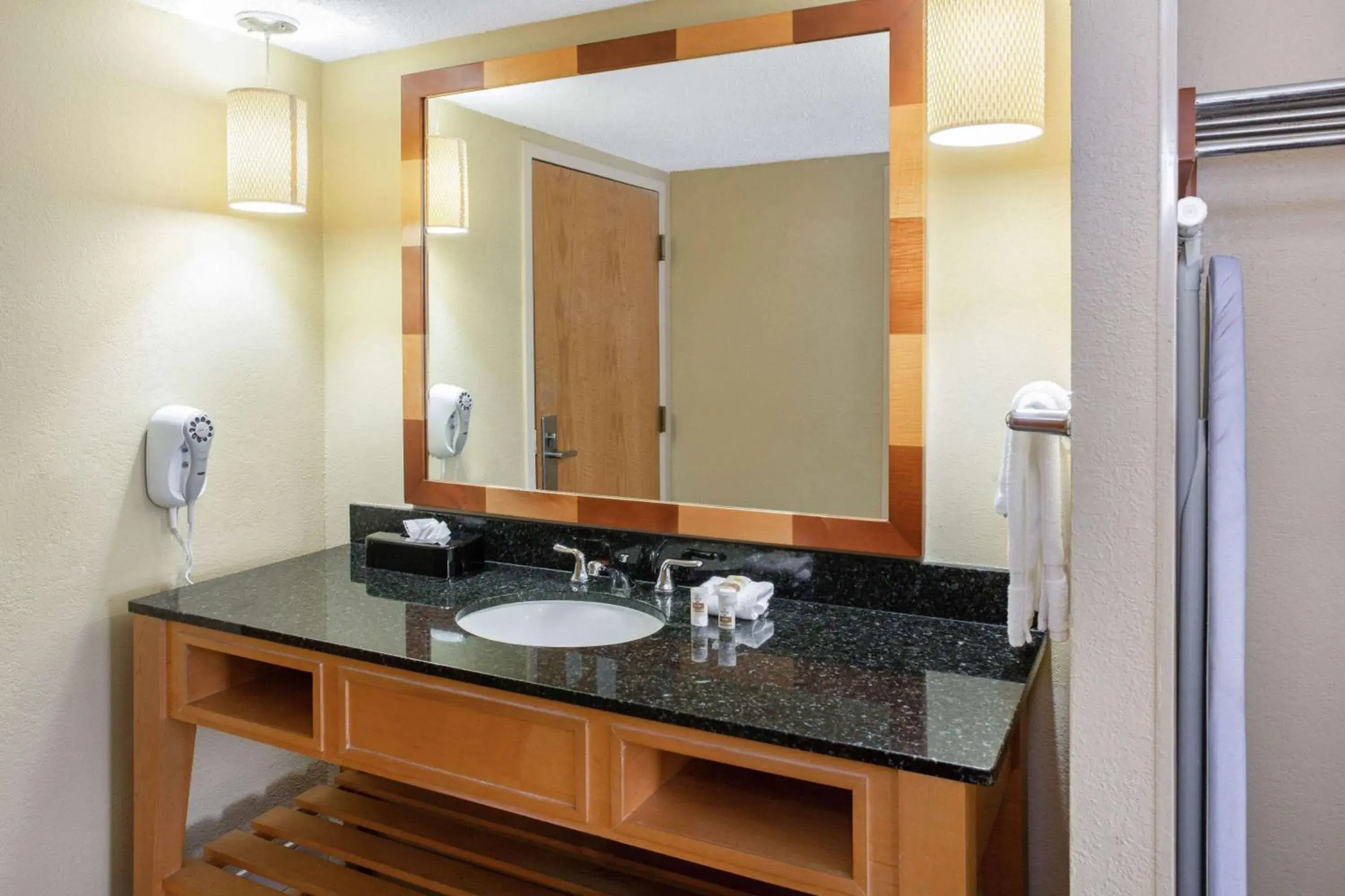 Bathroom in La Quinta by Wyndham Sarasota Downtown Bathroom in La Quinta by Wyndham Sarasota Downtown