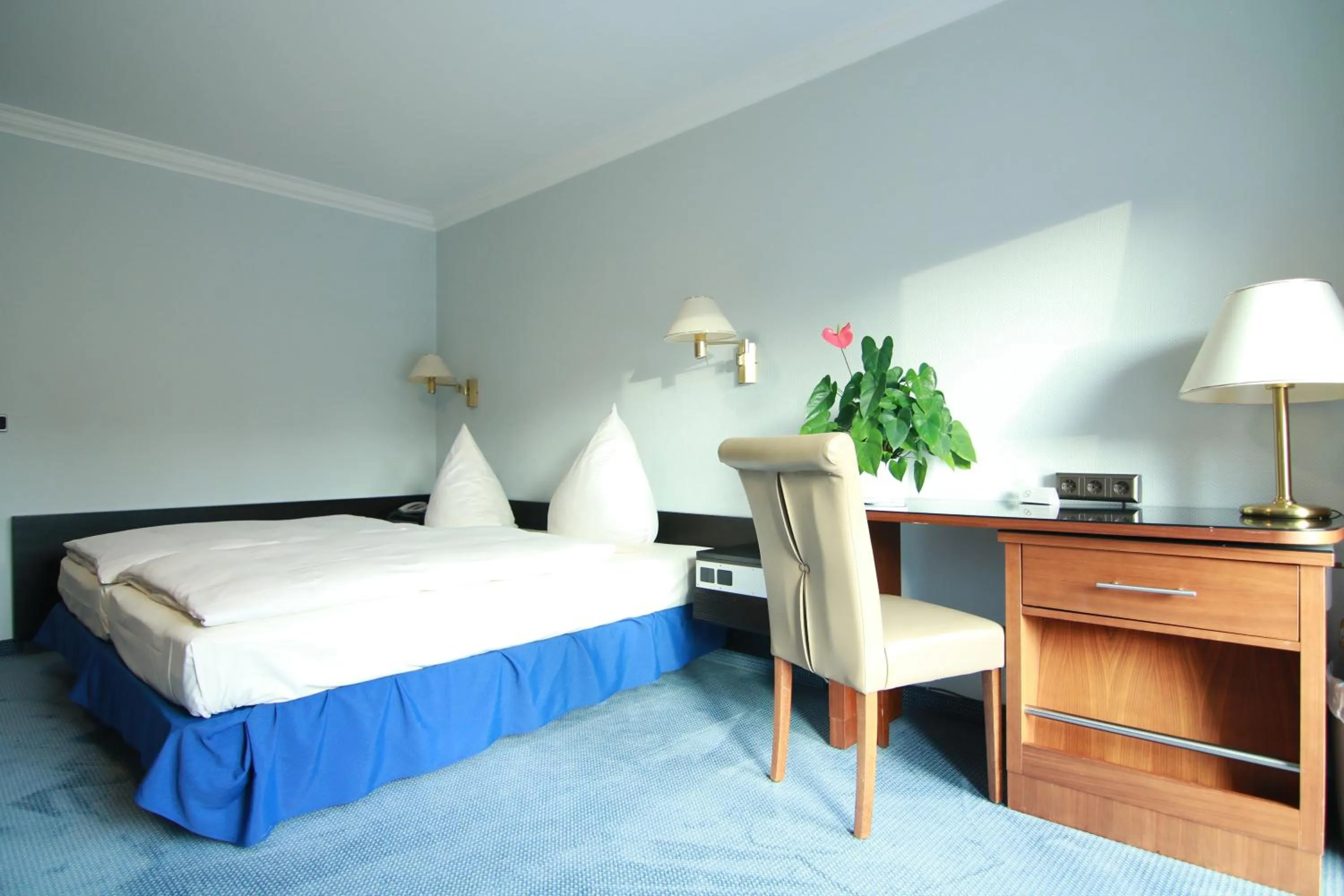 Photo of the whole room, Bed in Hotel-Restaurant Pfeffermühle Balingen