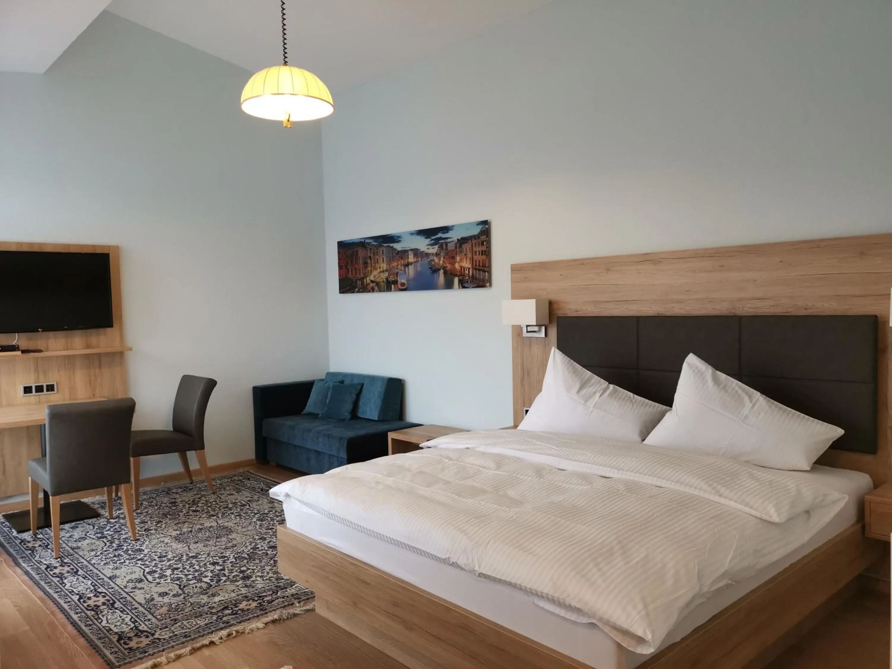 Photo of the whole room, Bed in Hotel-Restaurant Pfeffermühle Balingen