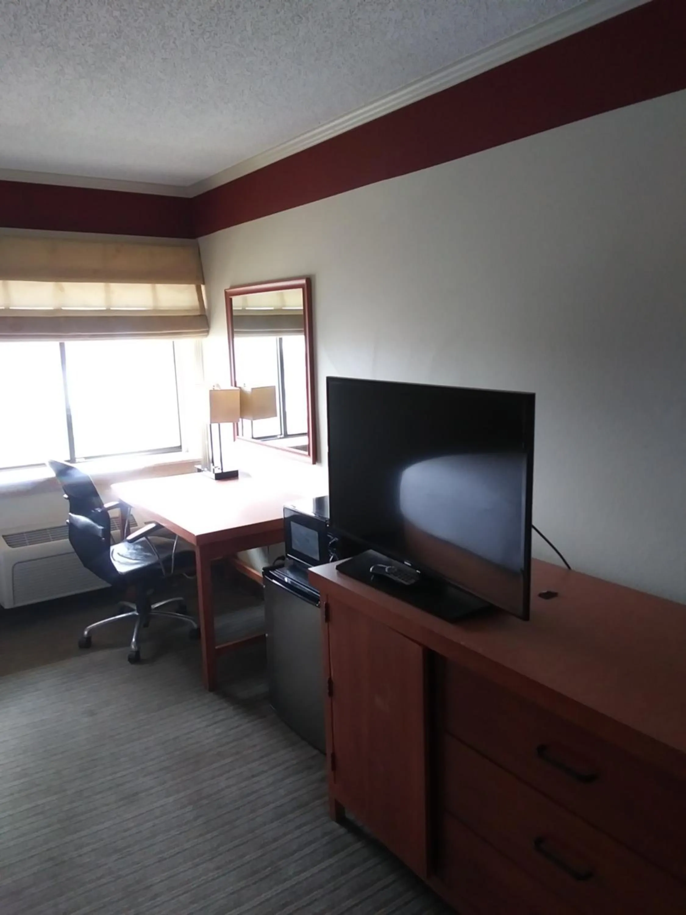 TV and multimedia in Travelodge by Wyndham Columbus State University