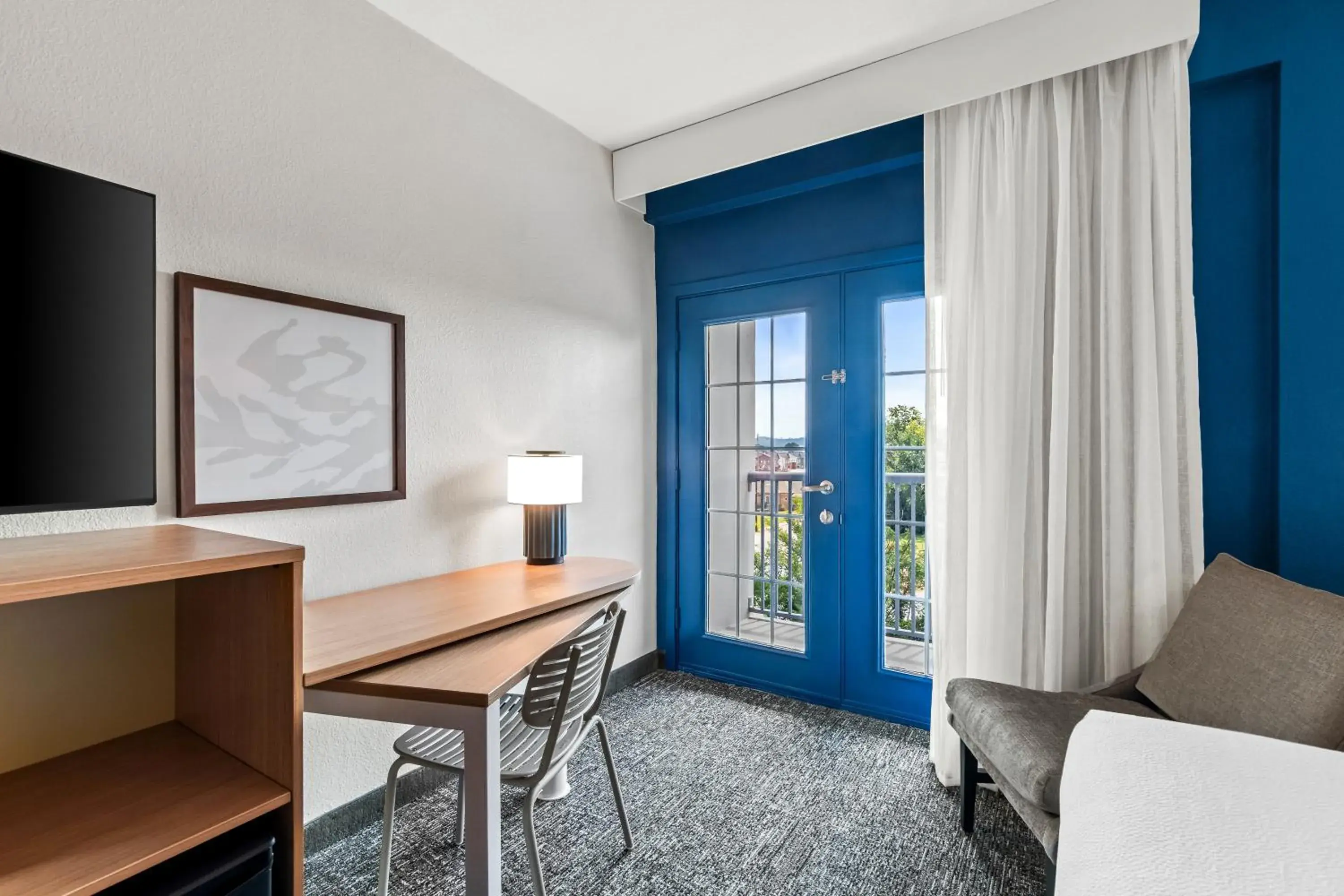 Seating area, Bed in Spark by Hilton Chattanooga Downtown Seating area, Bed in Spark by Hilton Chattanooga Downtown