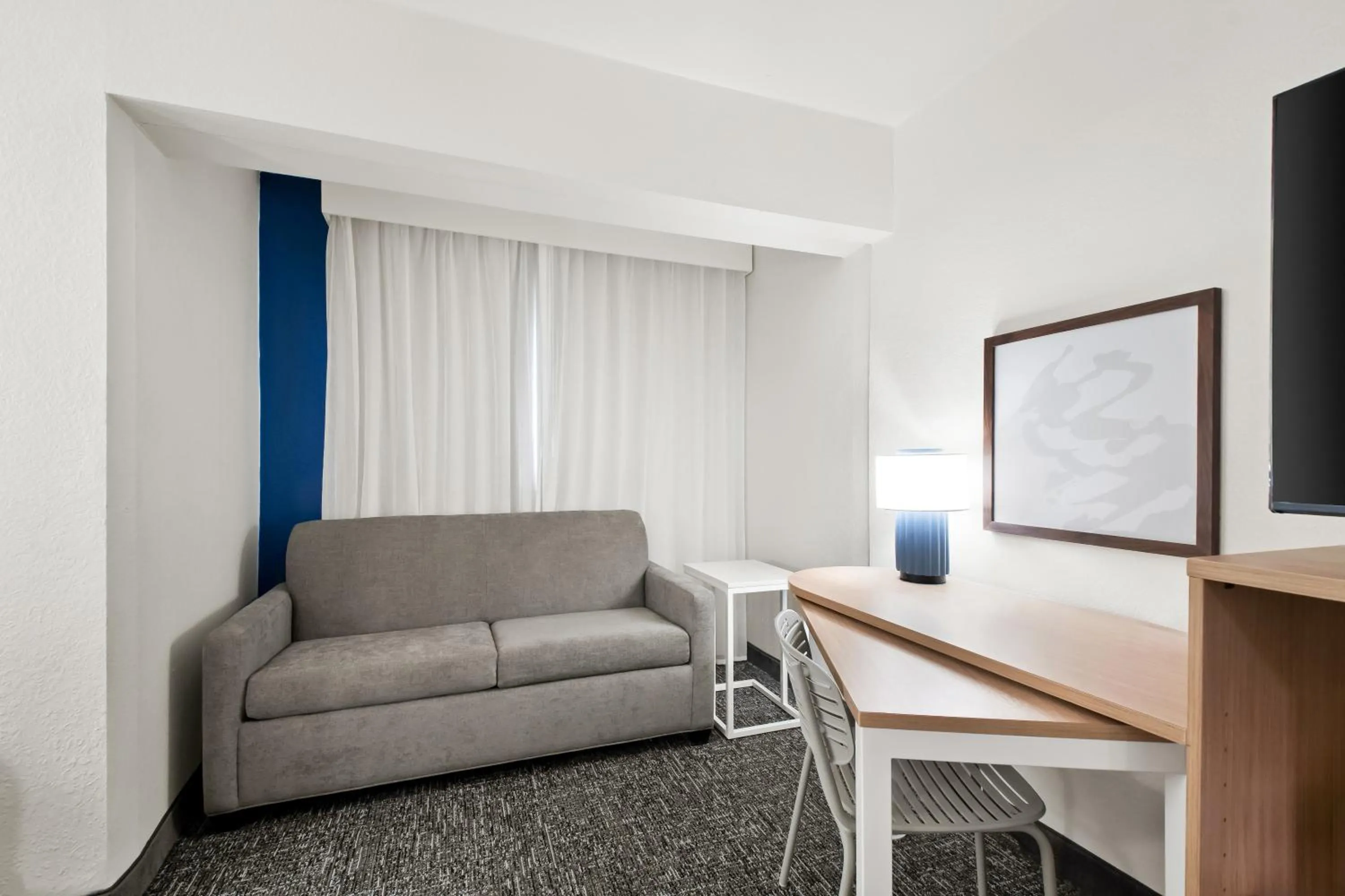 Seating area in Spark by Hilton Chattanooga Downtown