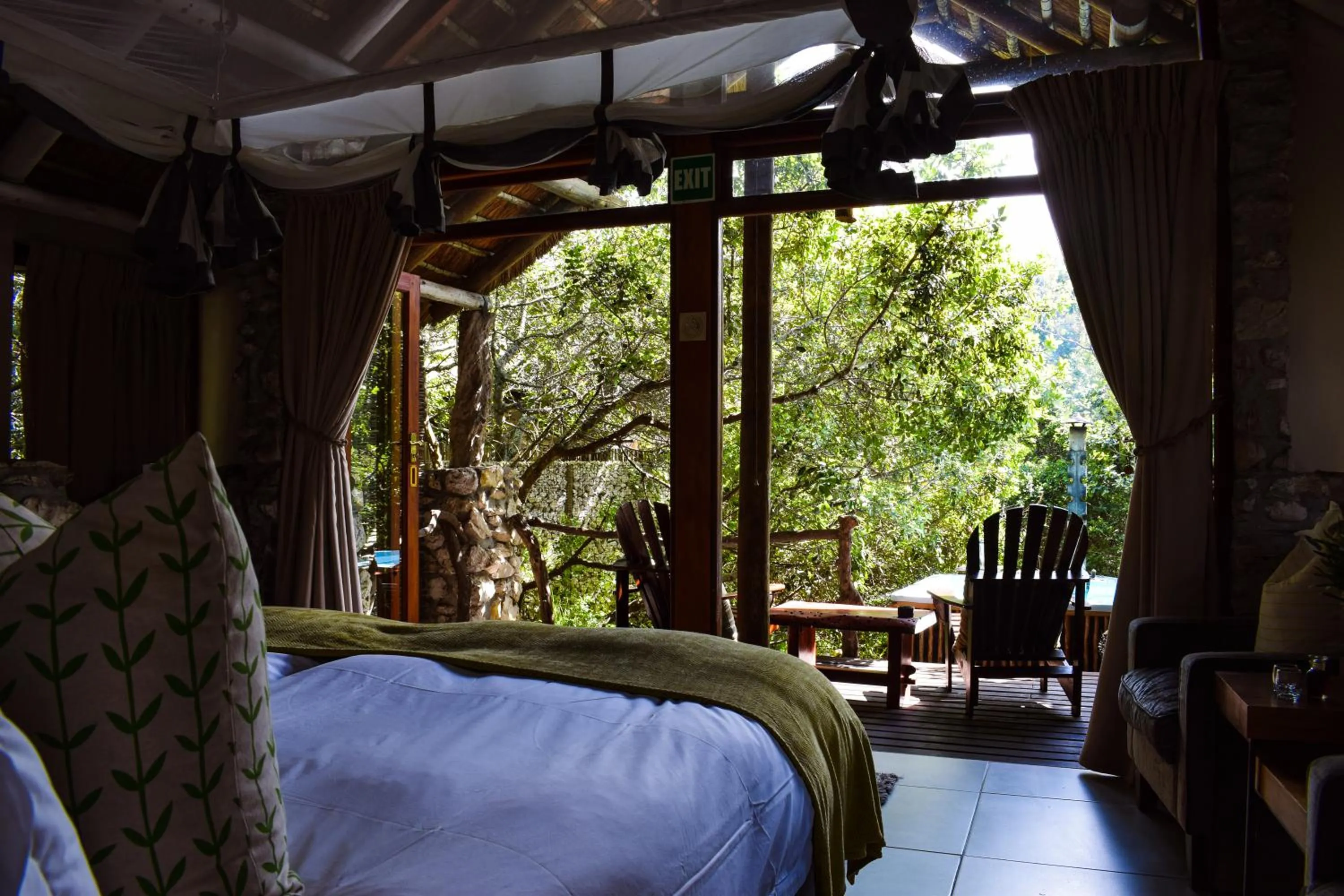 View (from property/room), Bed in Mosaic Lagoon Lodge