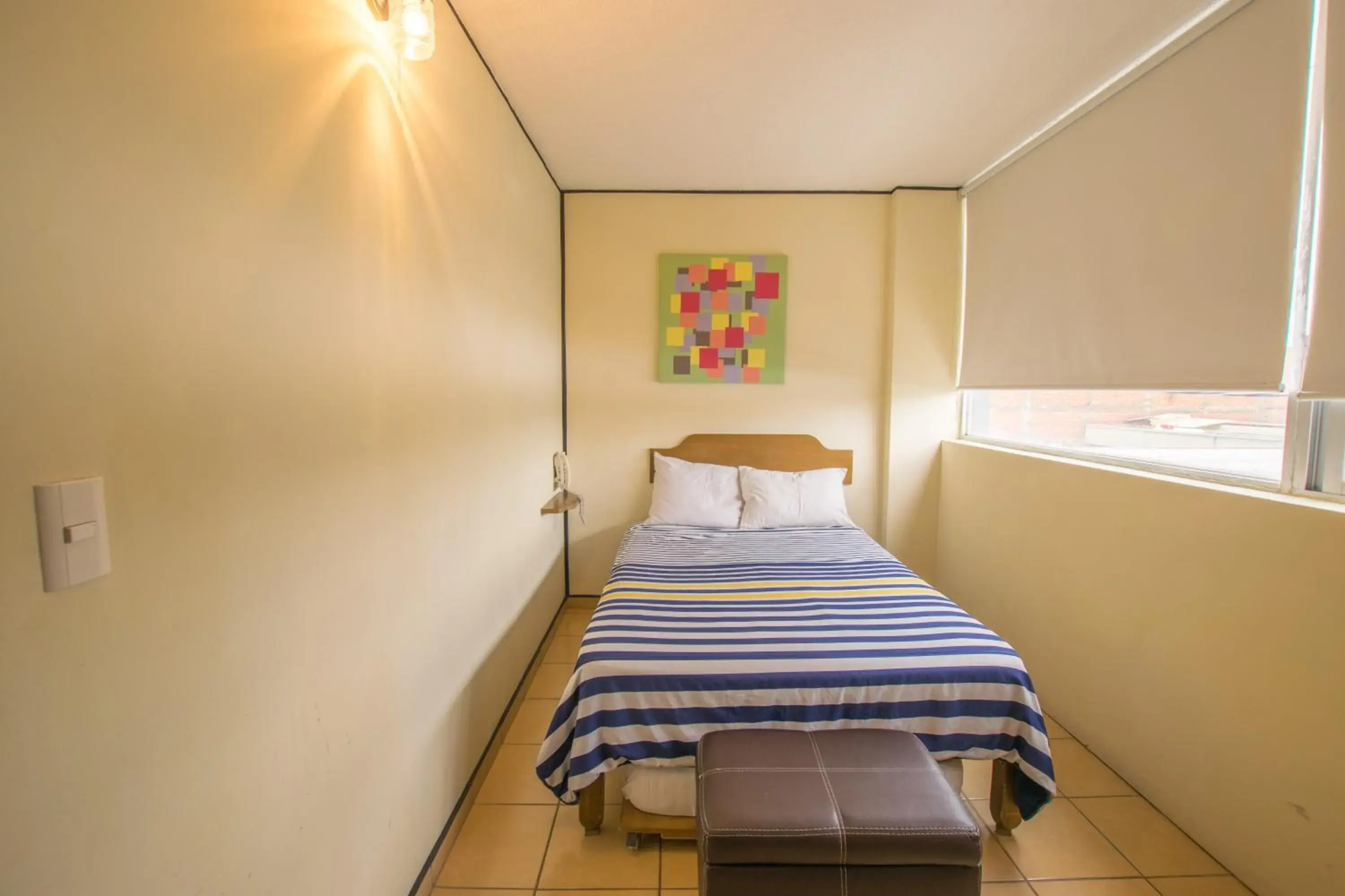 Basic Triple Room in Hotel Mateos 1215 Basic Triple Room in Hotel Mateos 1215