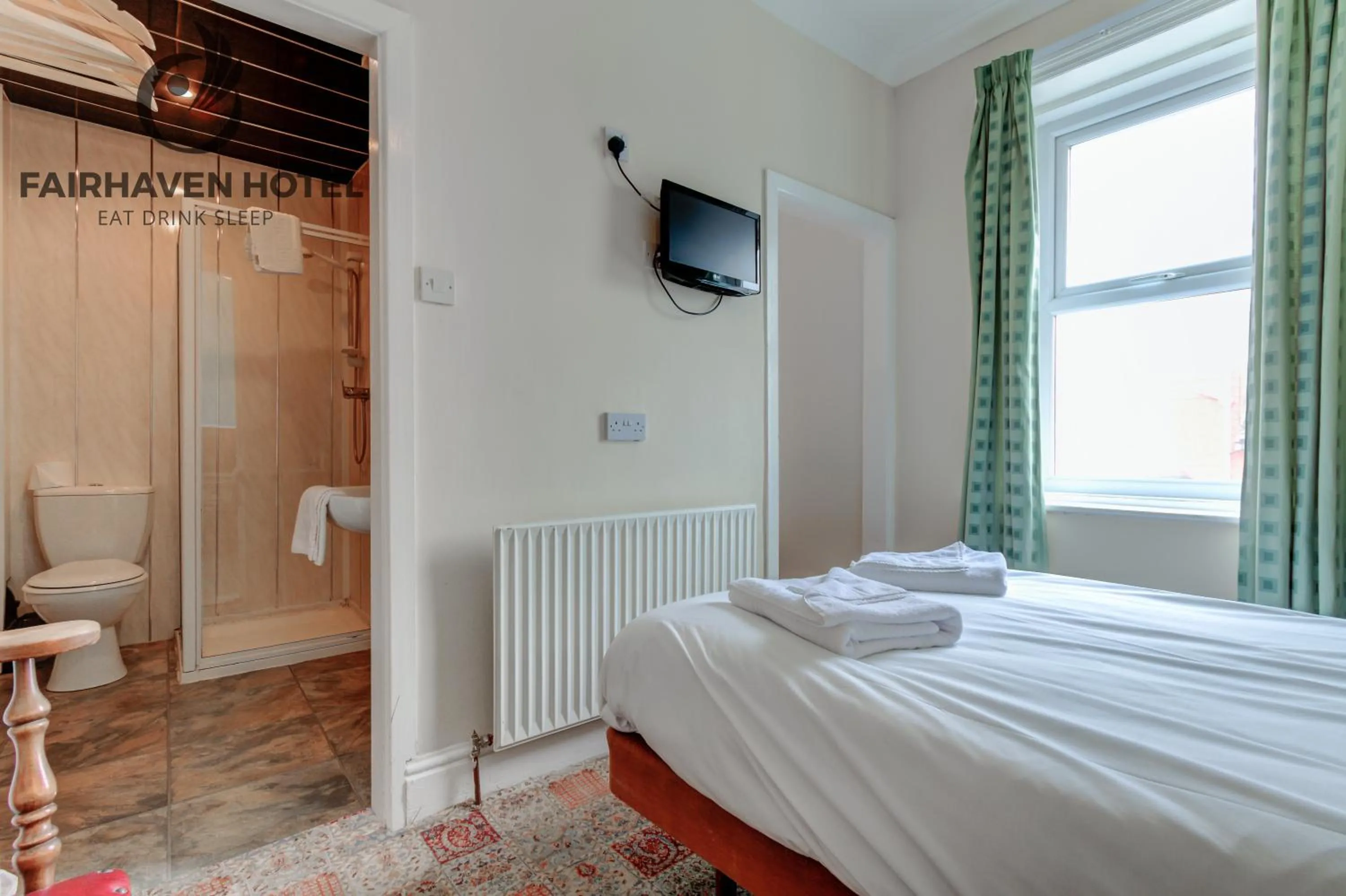 Bed in Fairhaven Hotel