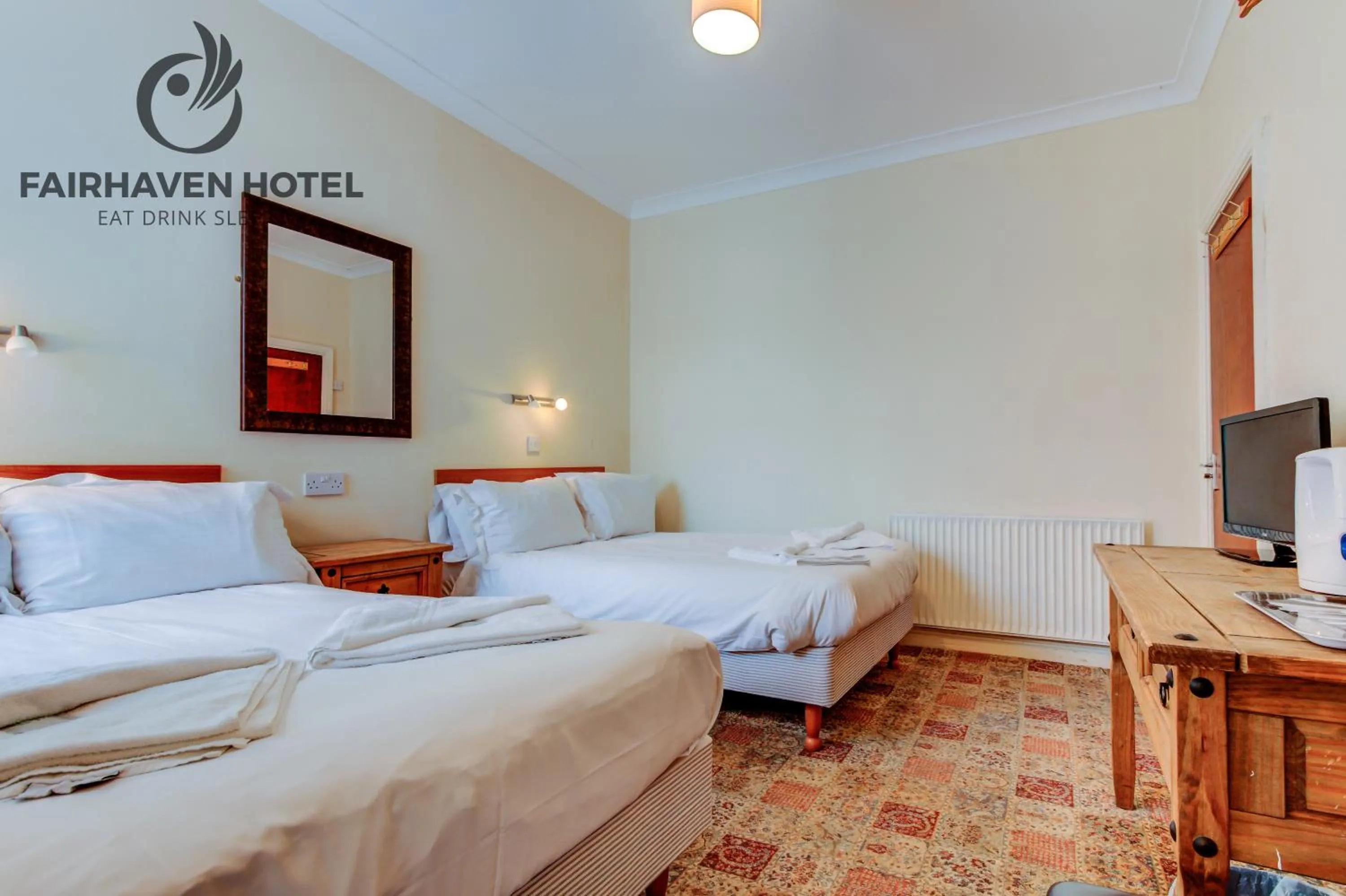 Bed in Fairhaven Hotel