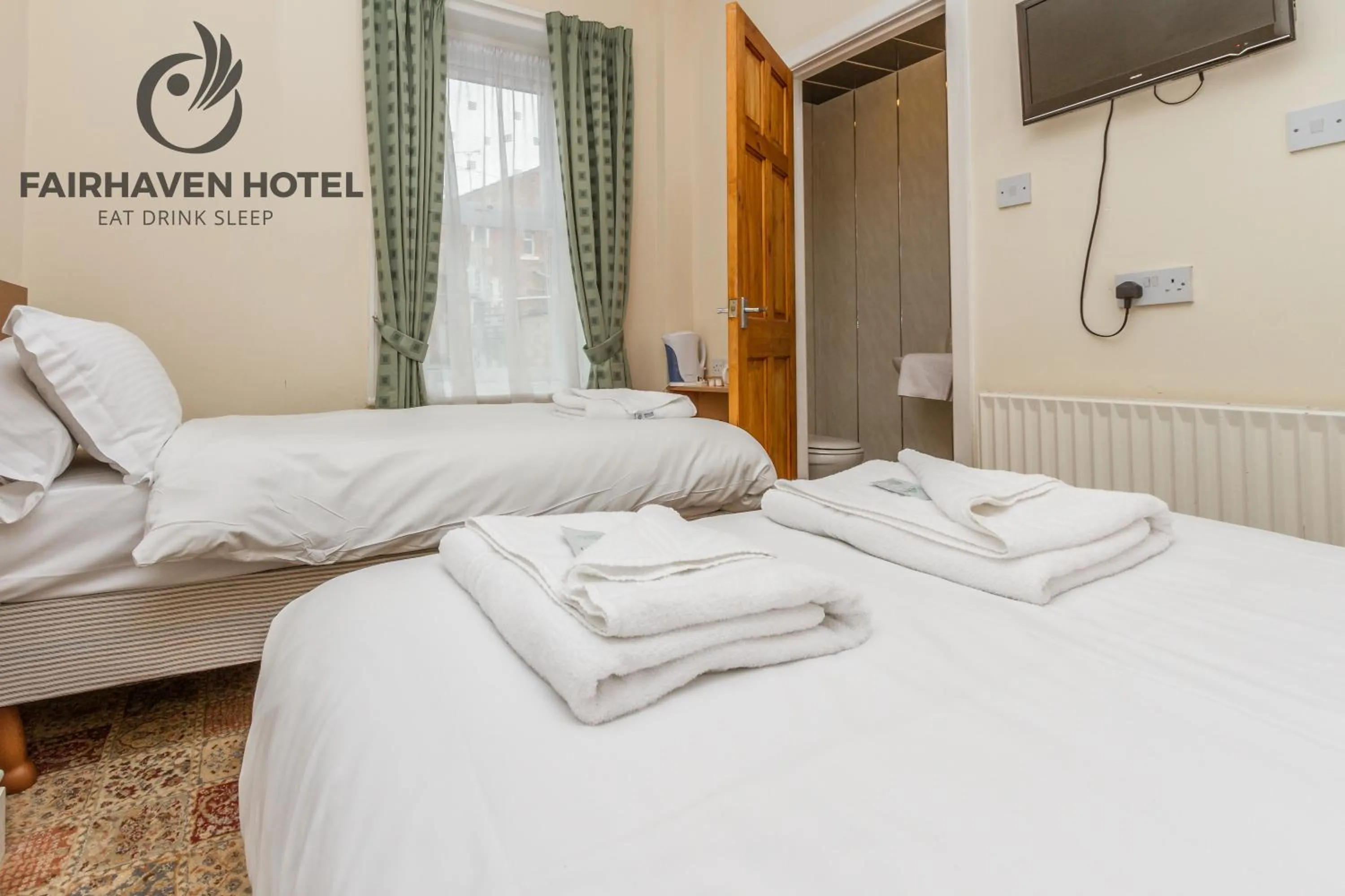 Bed in Fairhaven Hotel