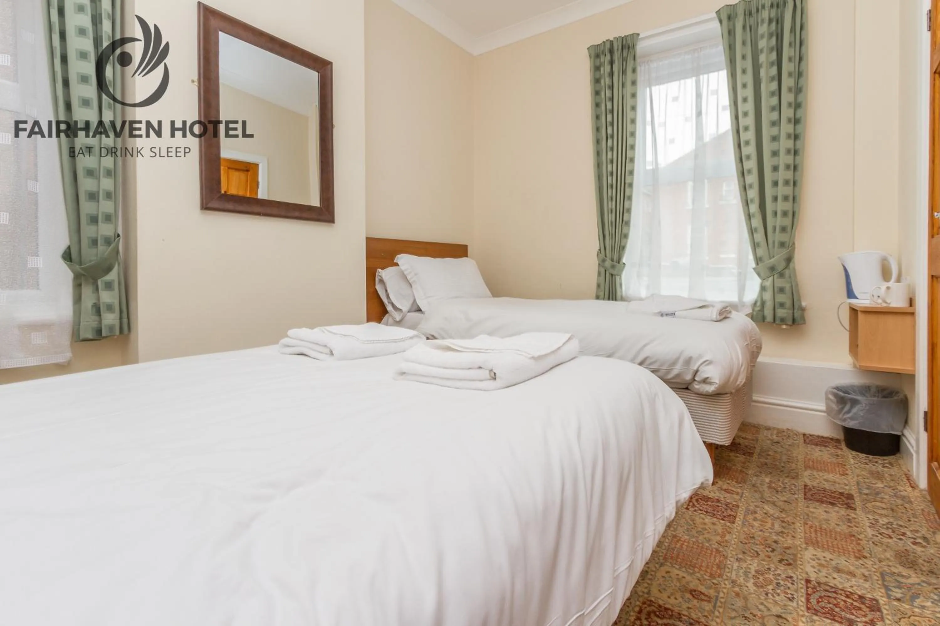 Bed in Fairhaven Hotel