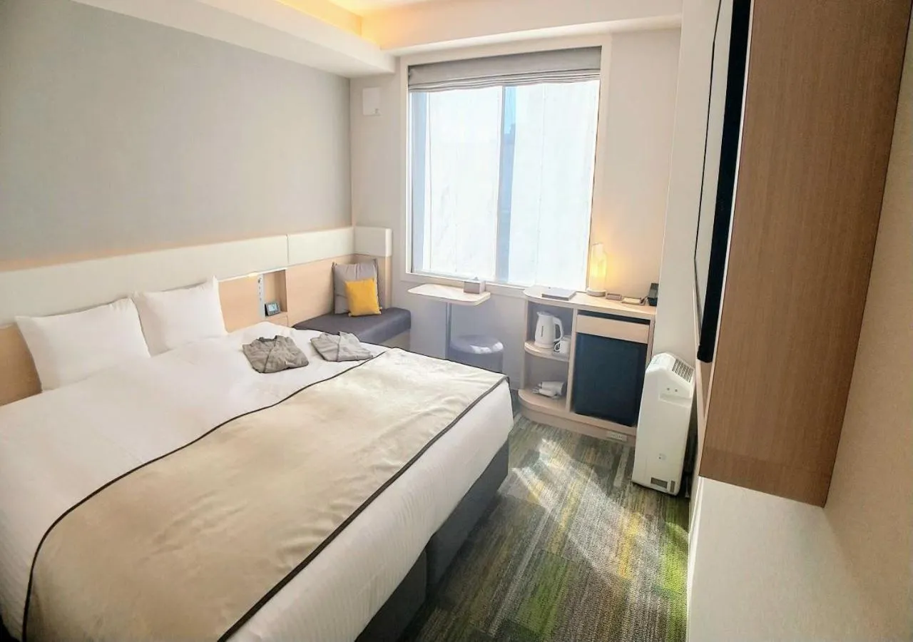 Bed in Urban Hotel Kyoto Gojo Premium