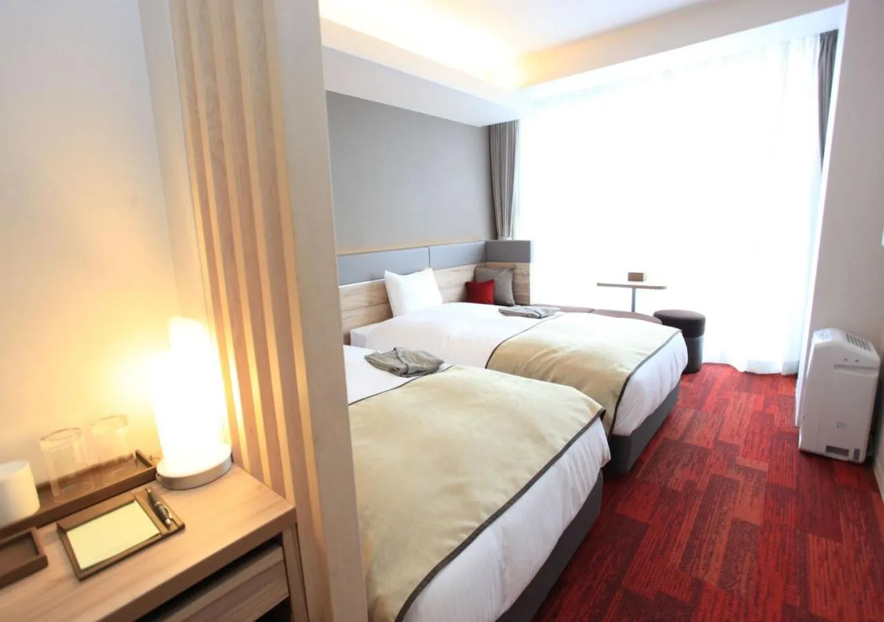 Bed in Urban Hotel Kyoto Gojo Premium