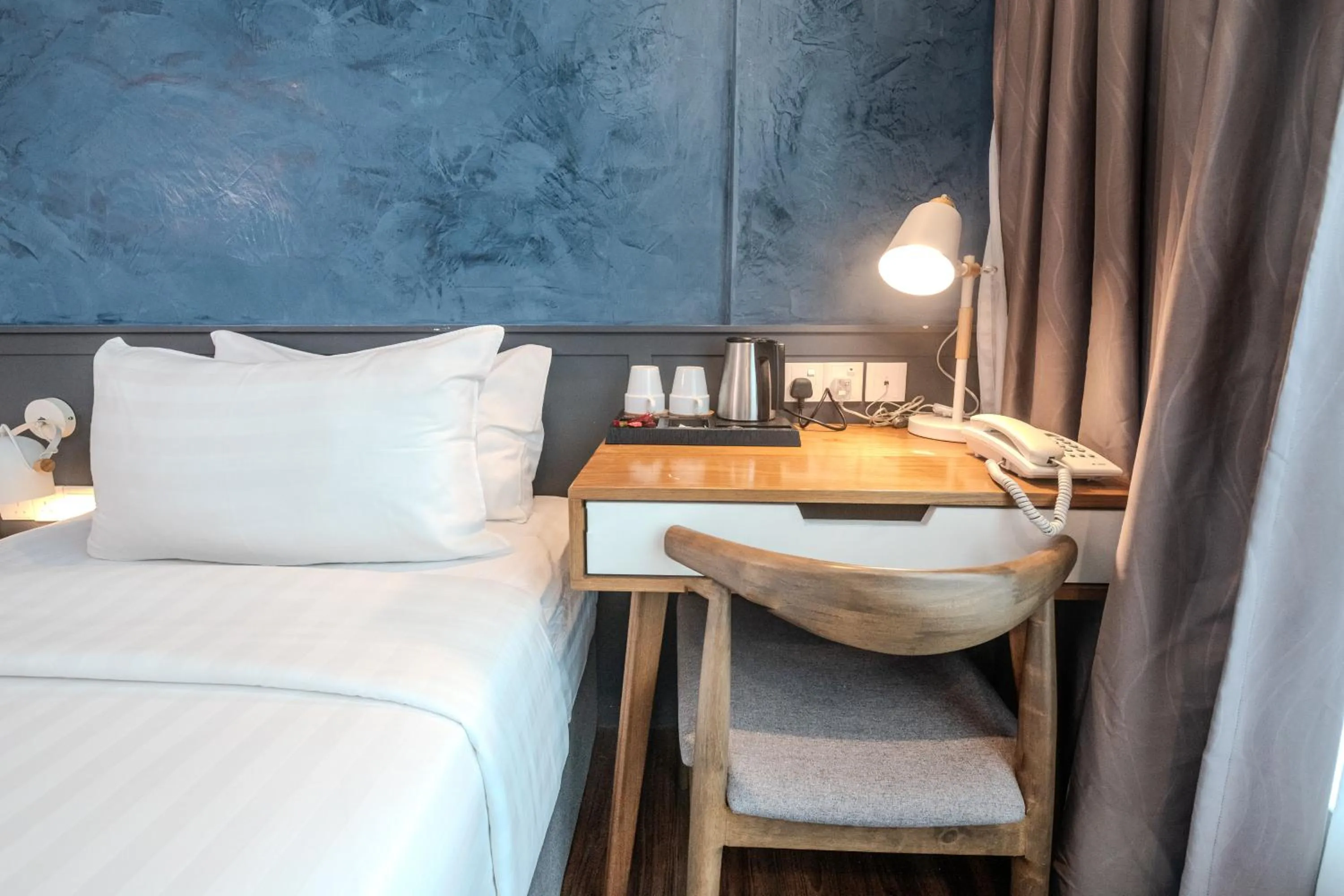 Seating area, Bed in O&G Hotel Parit Buntar