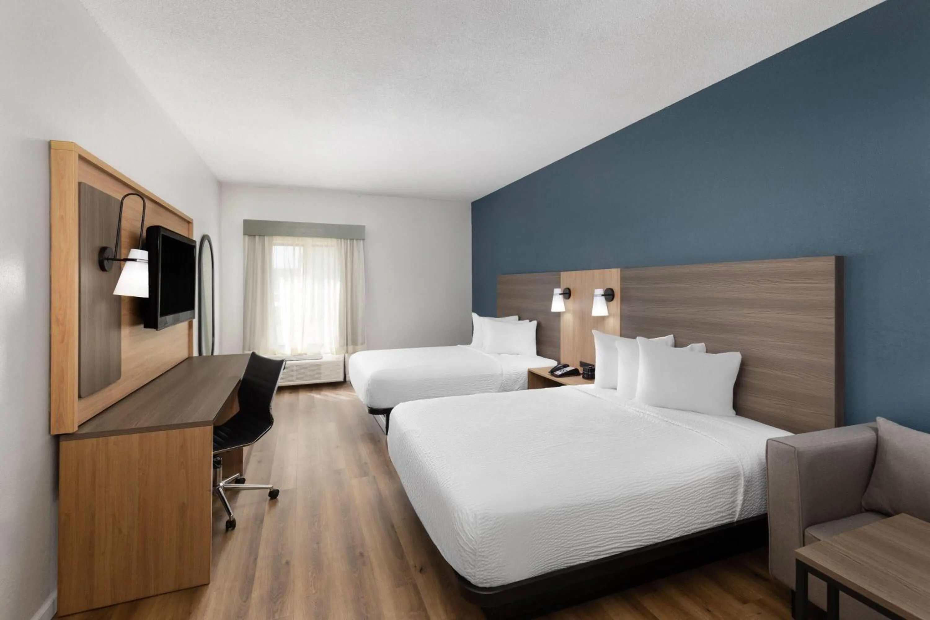 Photo of the whole room, Bed in Baymont by Wyndham Moss Point Pascagoula