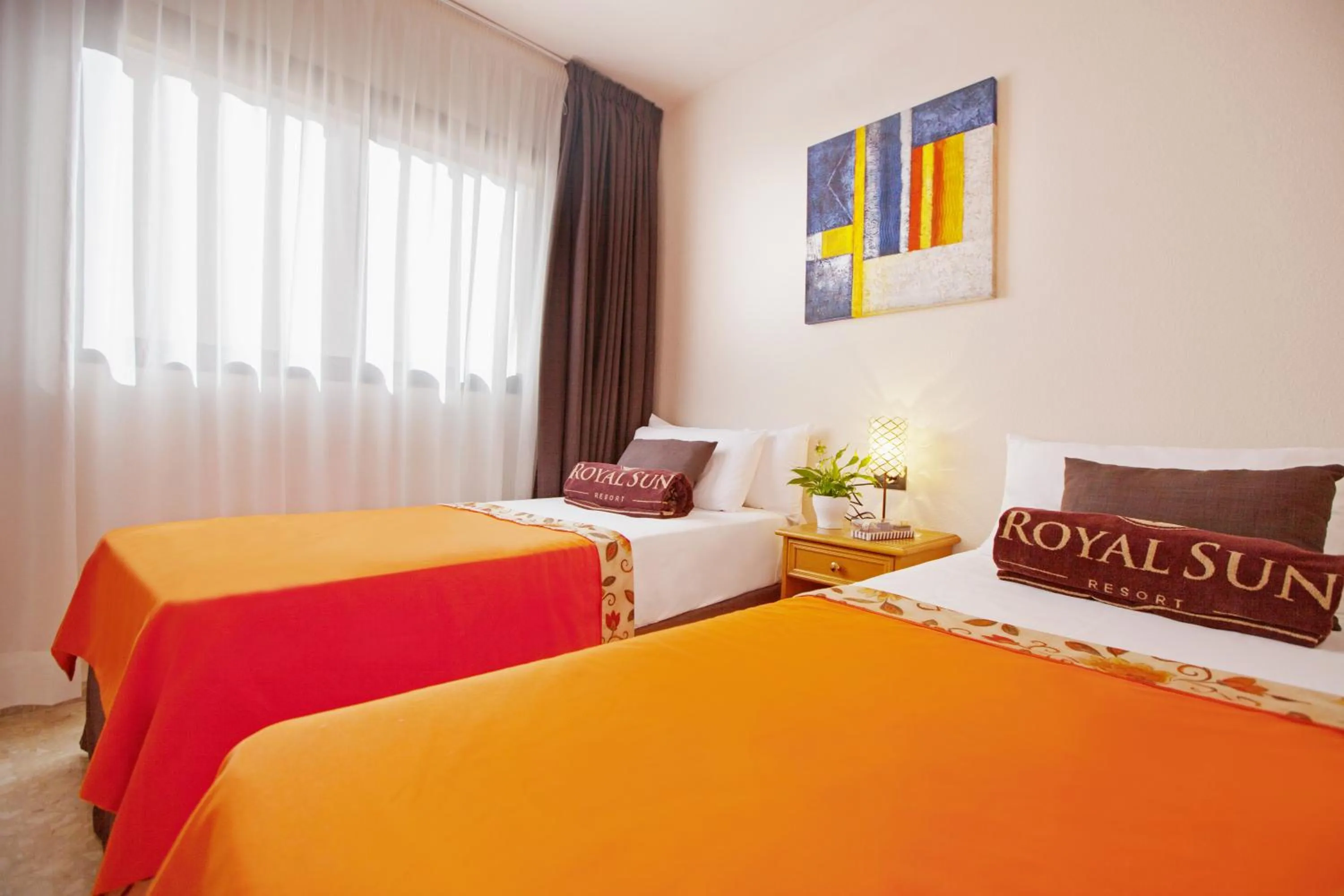 Bed in Royal Sun Resort